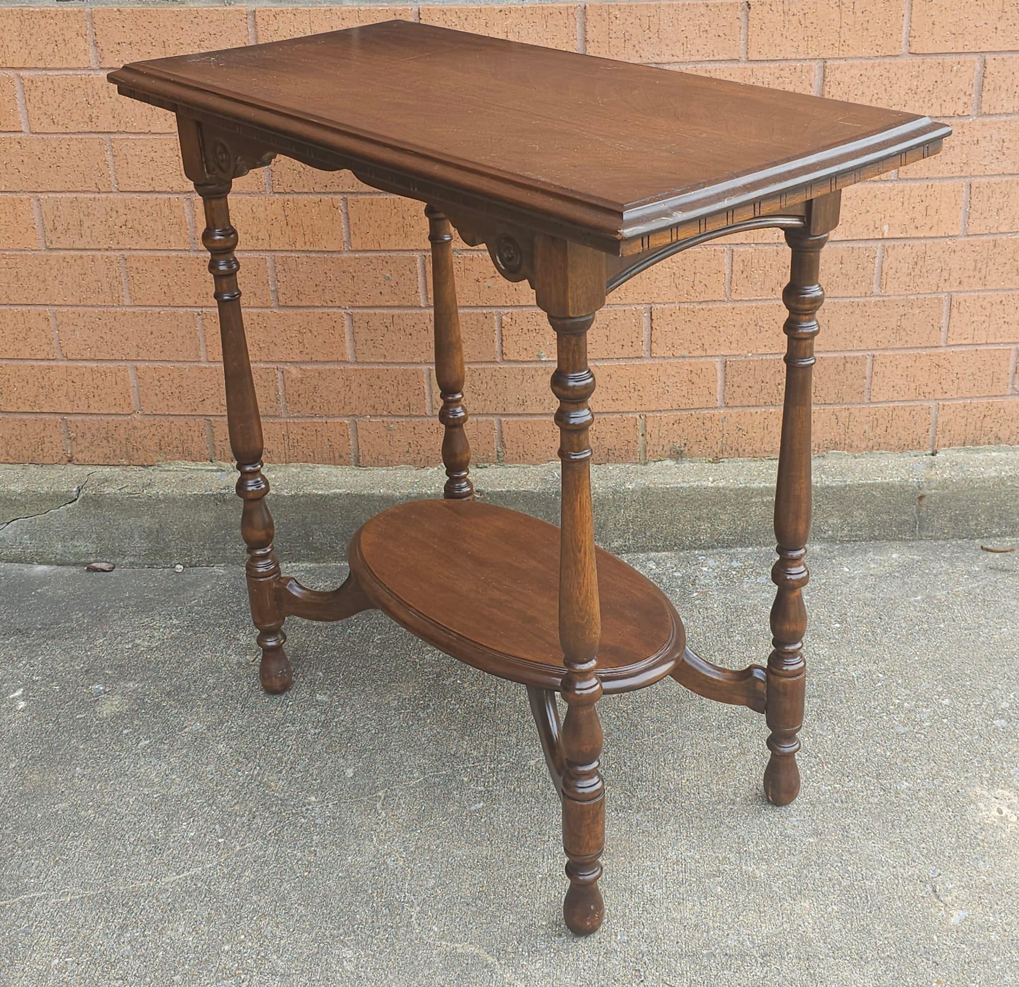 A Victorian Mahogany Tiered Console Table. Measures 29