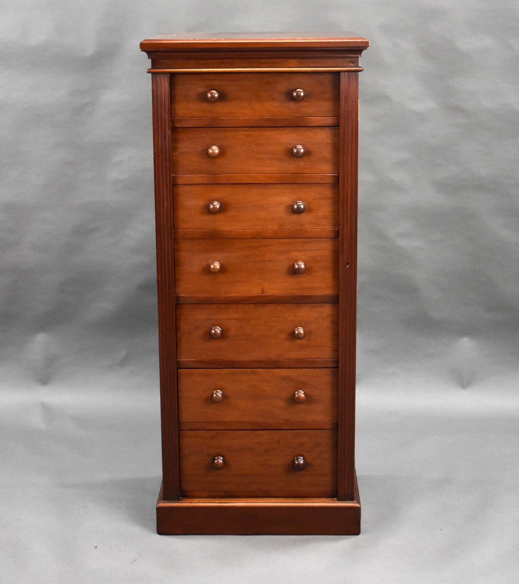 For sale is a good quality Victorian mahogany wellington chest, having an arrangement of seven graduated drawers, each with turned handles, secured by a side locker, the chest has a plinth base and remains in very good condition.

Width: 56cm Depth: