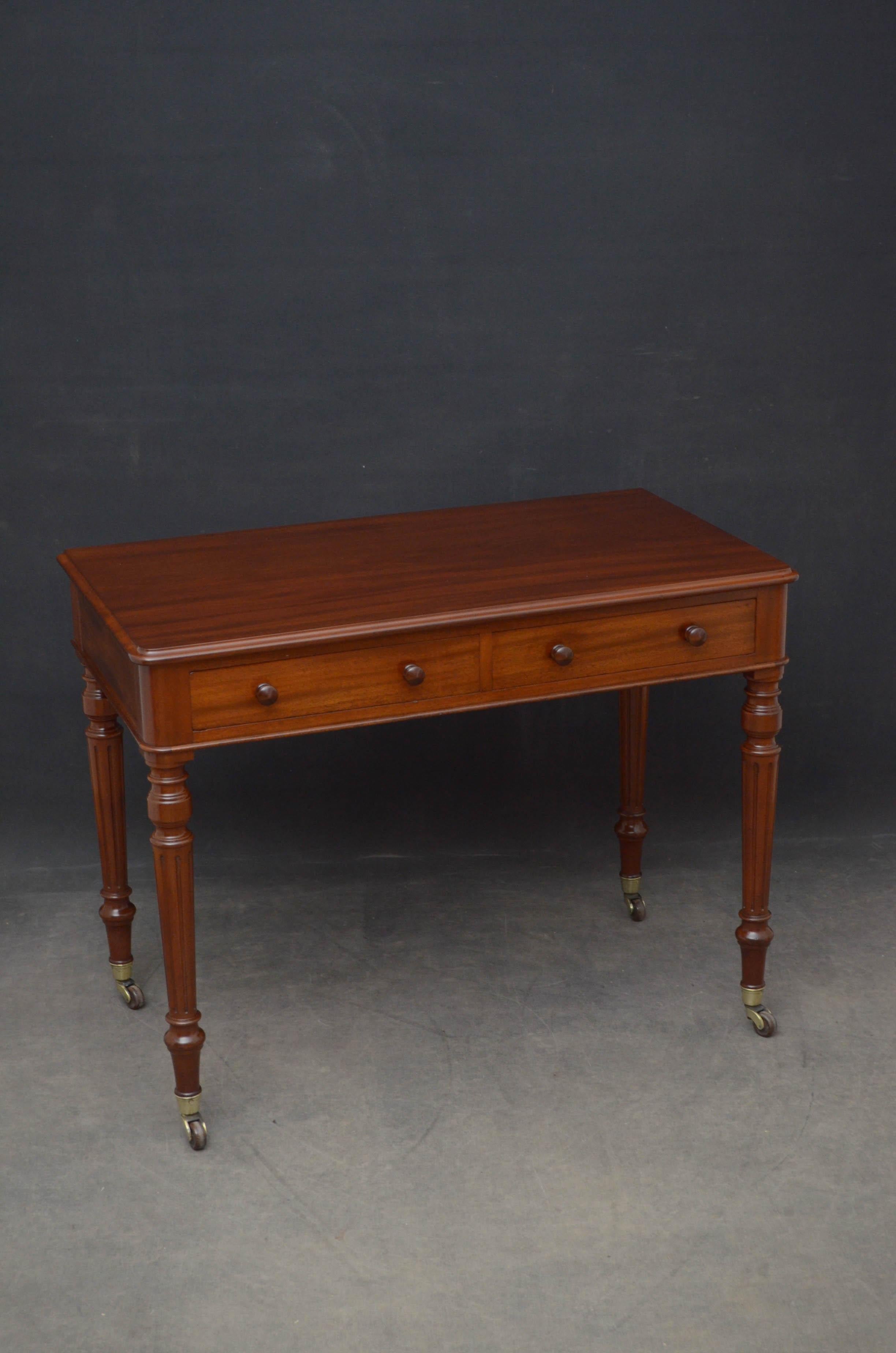 Sn4836 fine quality English, Victorian writing table, having solid mahogany figured top with moulded edge above 2 frieze drawers (stamped on edge Wilkinson & Son, 8 Old Bond Street) fitted with original turned handles, standing on elegant, turned