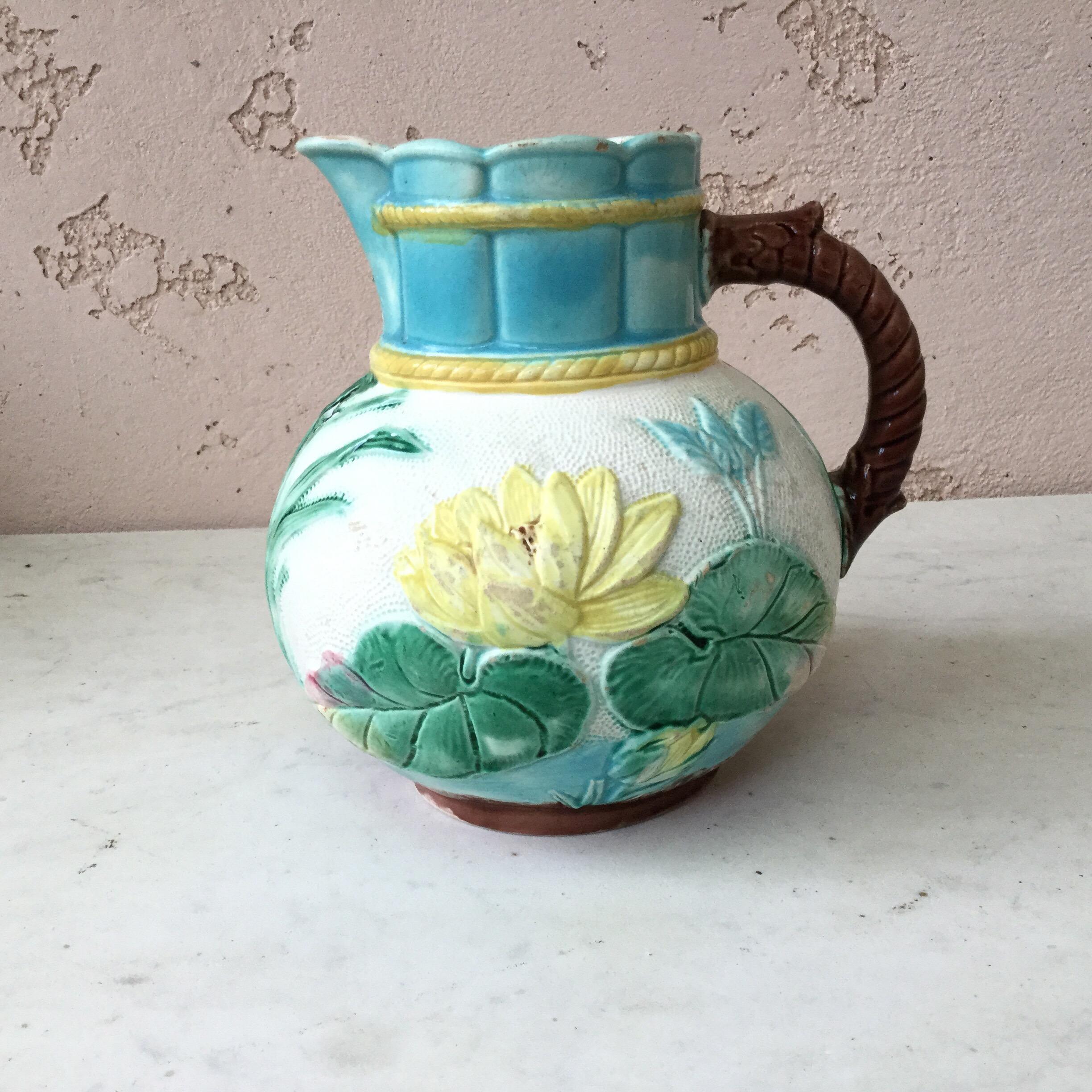 19th century majolica pitcher with water lily, circa 1890.
Victorian period.