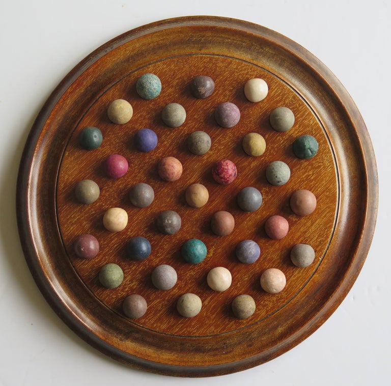 Victorian Marble Solitaire Game Hardwood Board 37 Handmade Clay or Stone Marbles In Good Condition For Sale In Lincoln, Lincolnshire