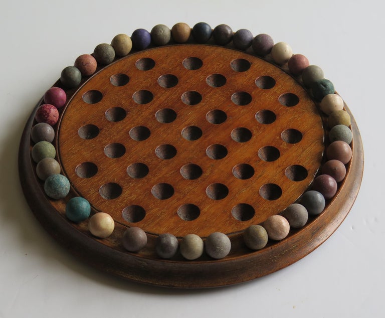 Victorian Marble Solitaire Game Hardwood Board 37 Handmade Clay or Stone Marbles For Sale 1