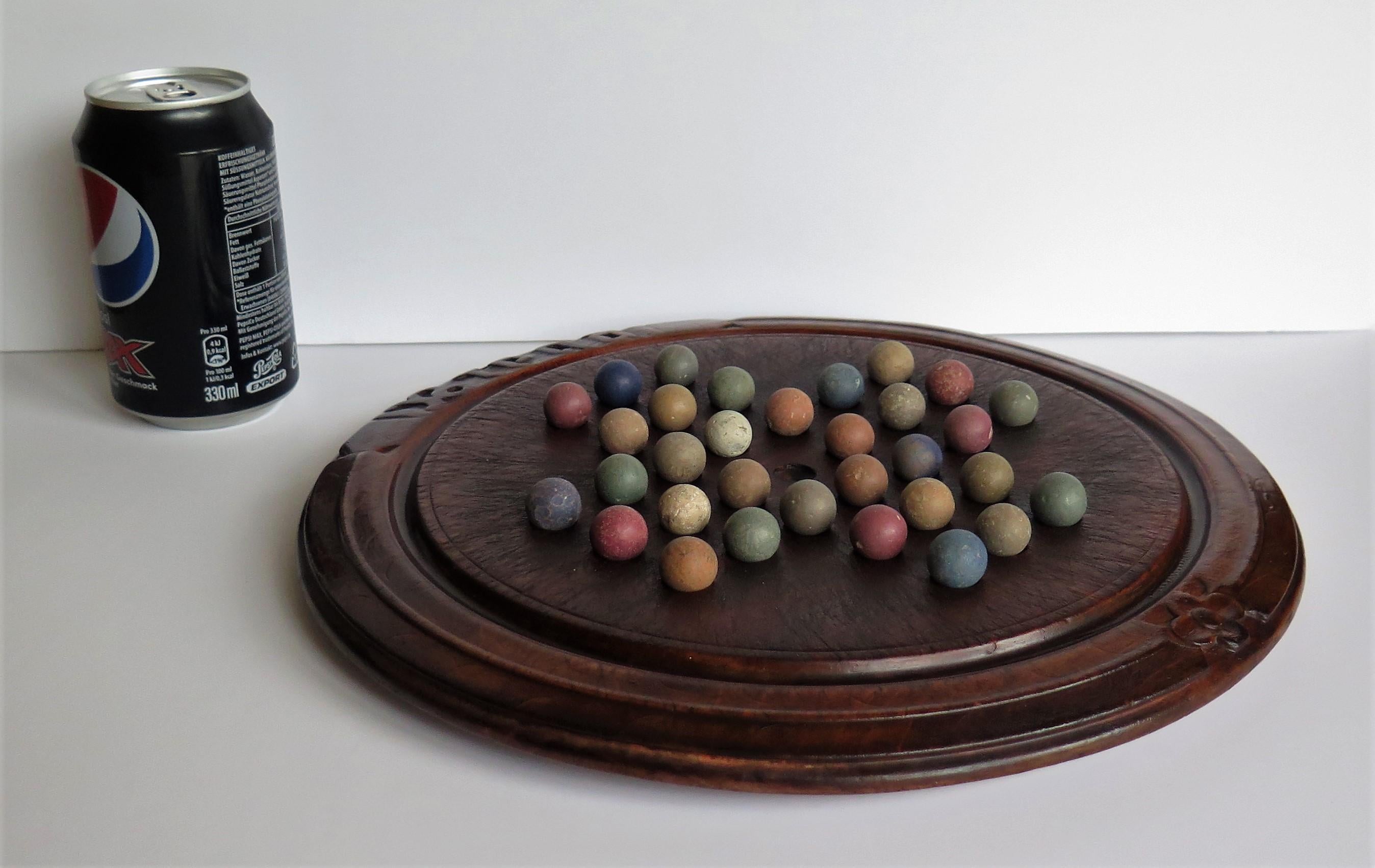 Victorian Marble Solitaire Game with Converted Folk Art Carved Breadboard 10