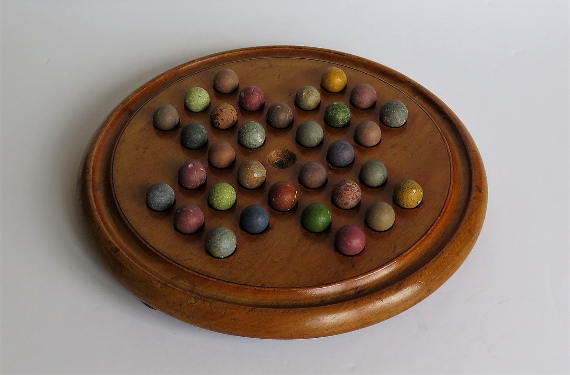 Folk Art Victorian Marble Solitaire Game with Mahogany Board and 32 Handmade Marbles