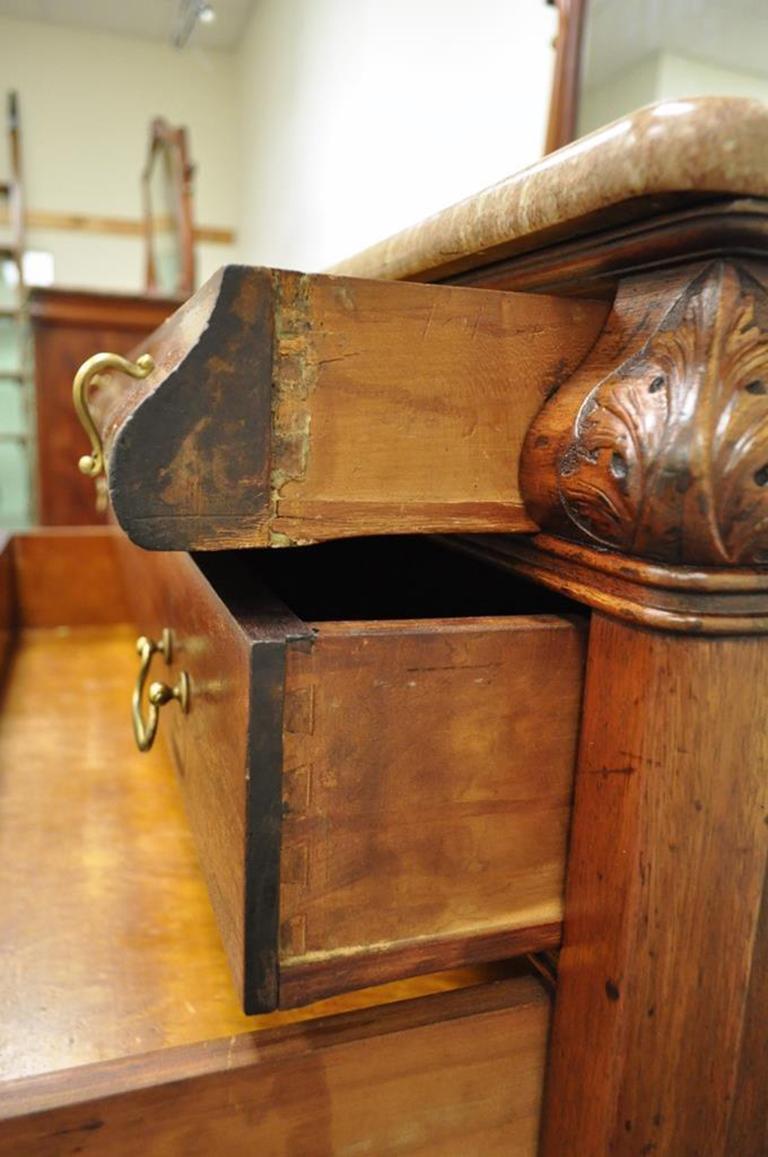 Victorian Marble-Top Carved Mahogany Ball and Claw Foot Dresser and Mirror In Good Condition In Philadelphia, PA
