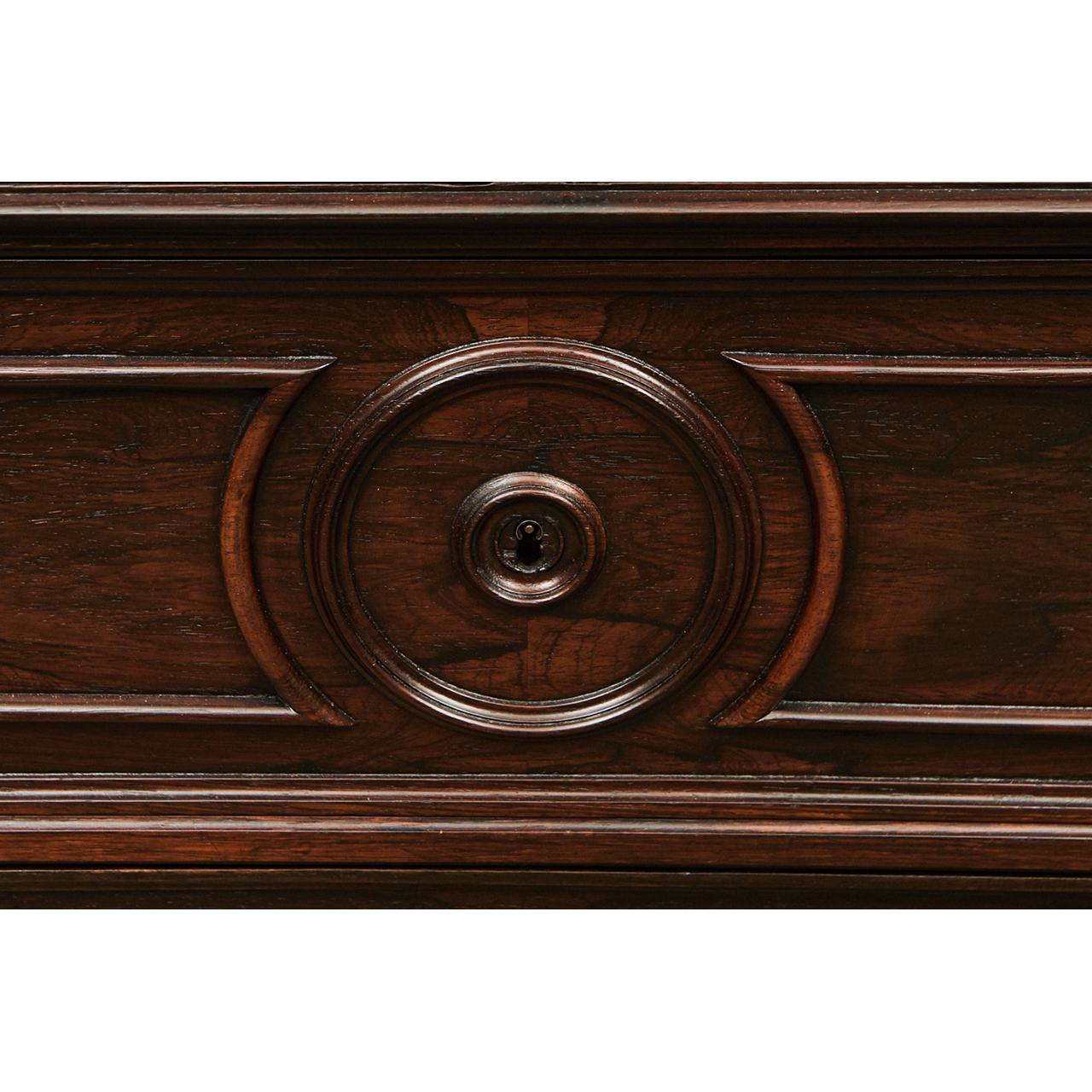 This lovely Victorian walnut commode with a marble top has beautiful craftsmanship inside and out. Each drawer has fine dovetail joints. The piece has walnut veneer. The molding details and turned wooden escutcheons indicate it’s age and quality.
 