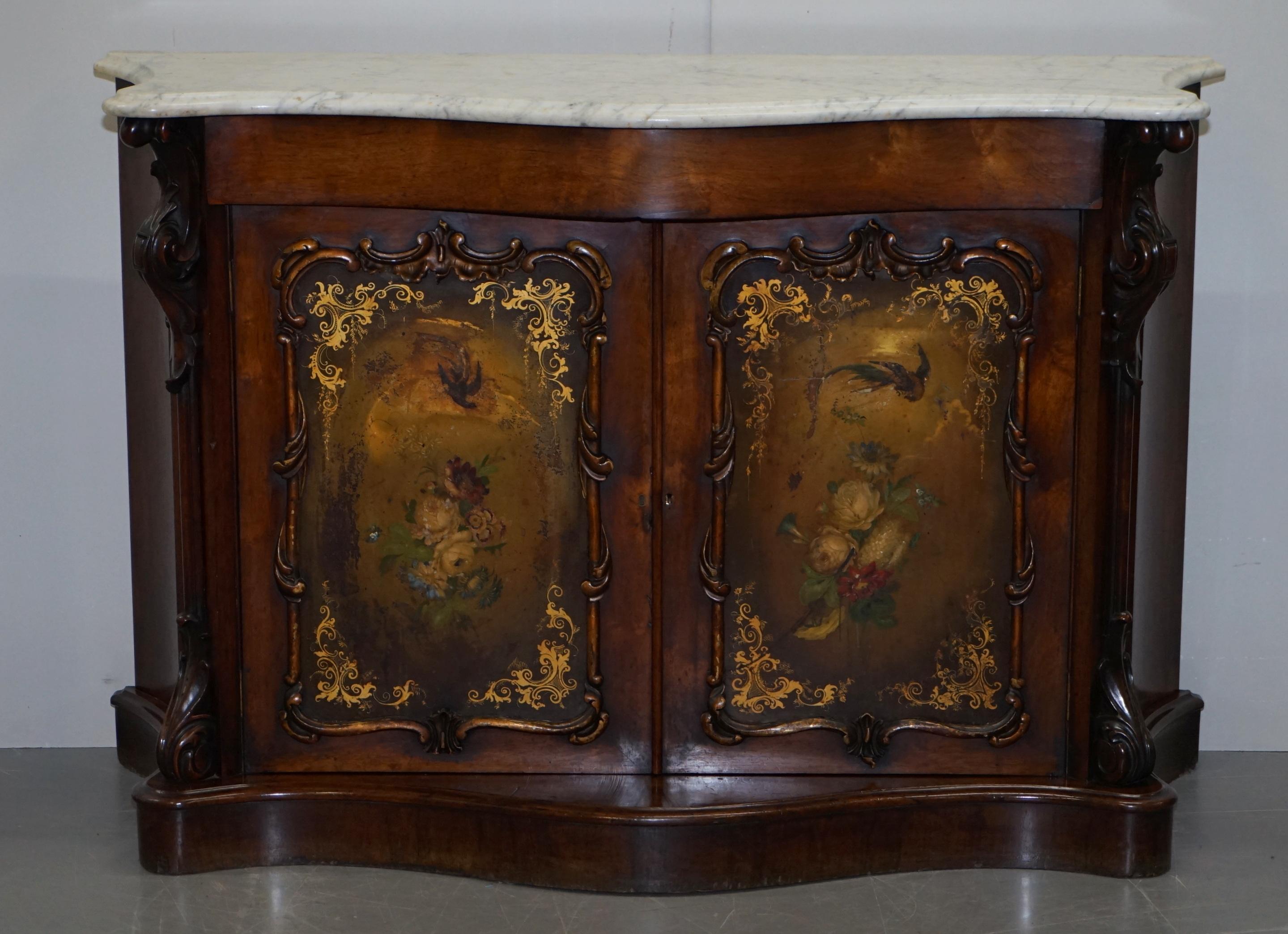 We are delighted to offer for sale this sublime Victorian circa 1860 walnut serpentine sideboard with thick marble top and Verdi Martin style paintings 

This has to be one of the most beautiful sideboards on the market today, the carving is truly
