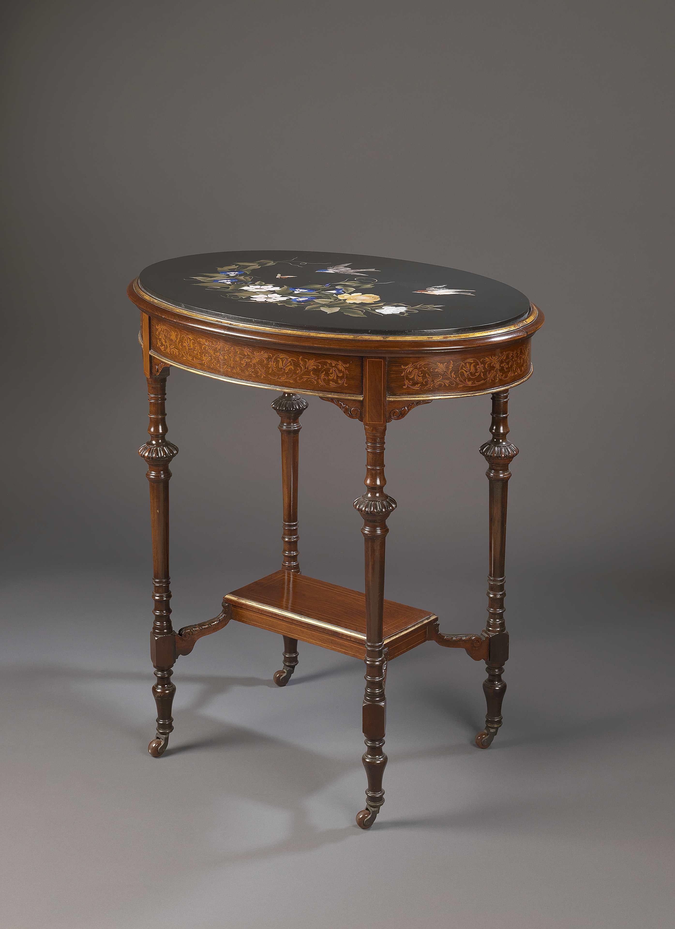 A Victorian marquetry inlaid oval table with an inlaid Ashford marble top, attributed to Collinson and Lock.

English, circa 1880.

The firm of Collinson & Lock was established in London in the third quarter of the Nineteenth century with the