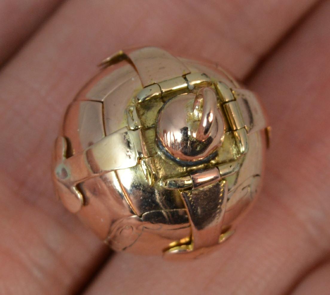 Fine quality solid Masonic / mason's ball. Opens up fully. Stylish piece. 9ct rose gold on silver ball and solid 9 carat gold top. True antique example, rare to find a true antique piece. Each claw to the top has its own hinge.

CONDITION ; Good for