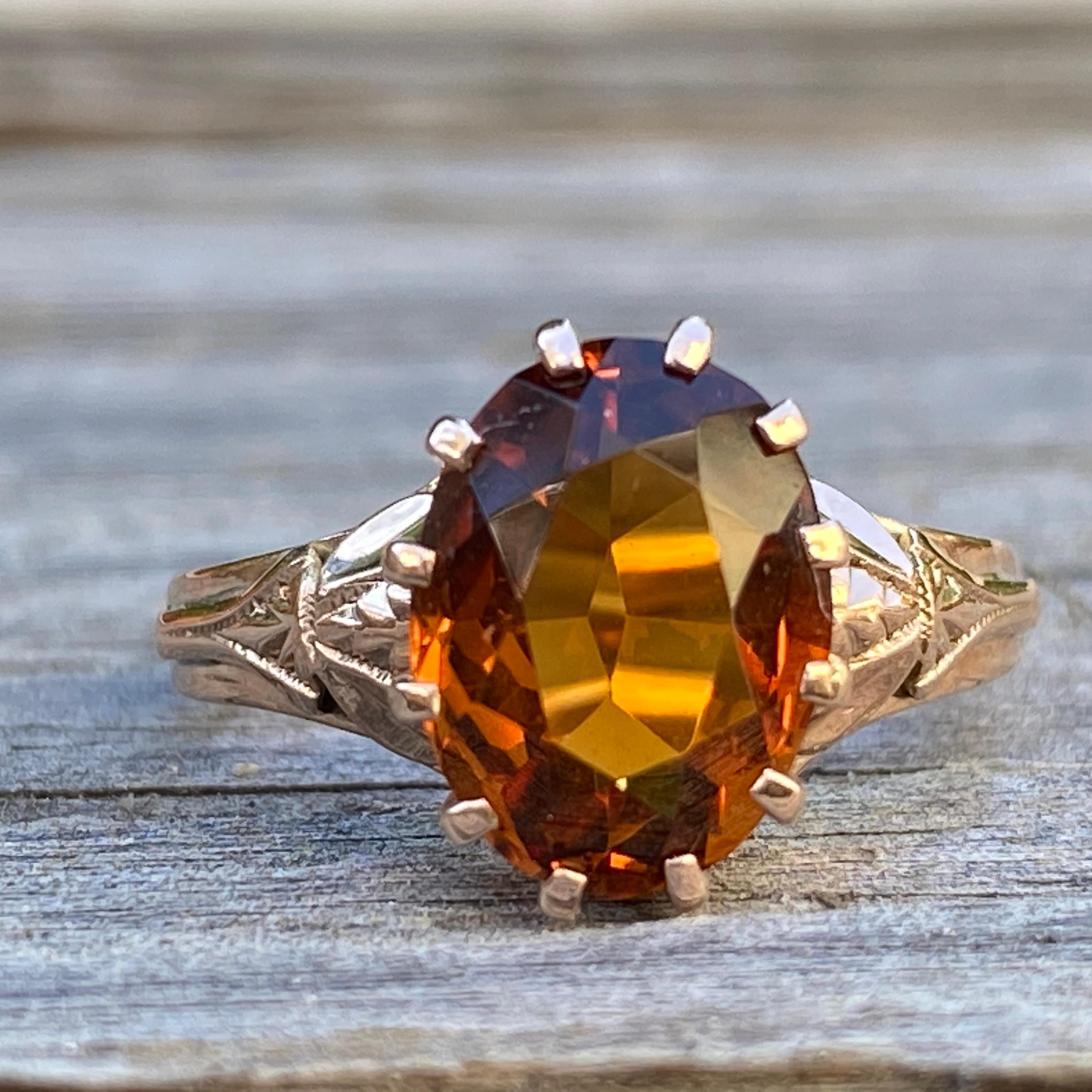 Details:
Stunning Madeira Citrine set in 10K rose gold. The citrine is a gorgeous rich orange color. The Victorian setting has a sweet leaf pattern on the shoulders and a lovely claw setting. Please ask all necessary questions prior to placing an