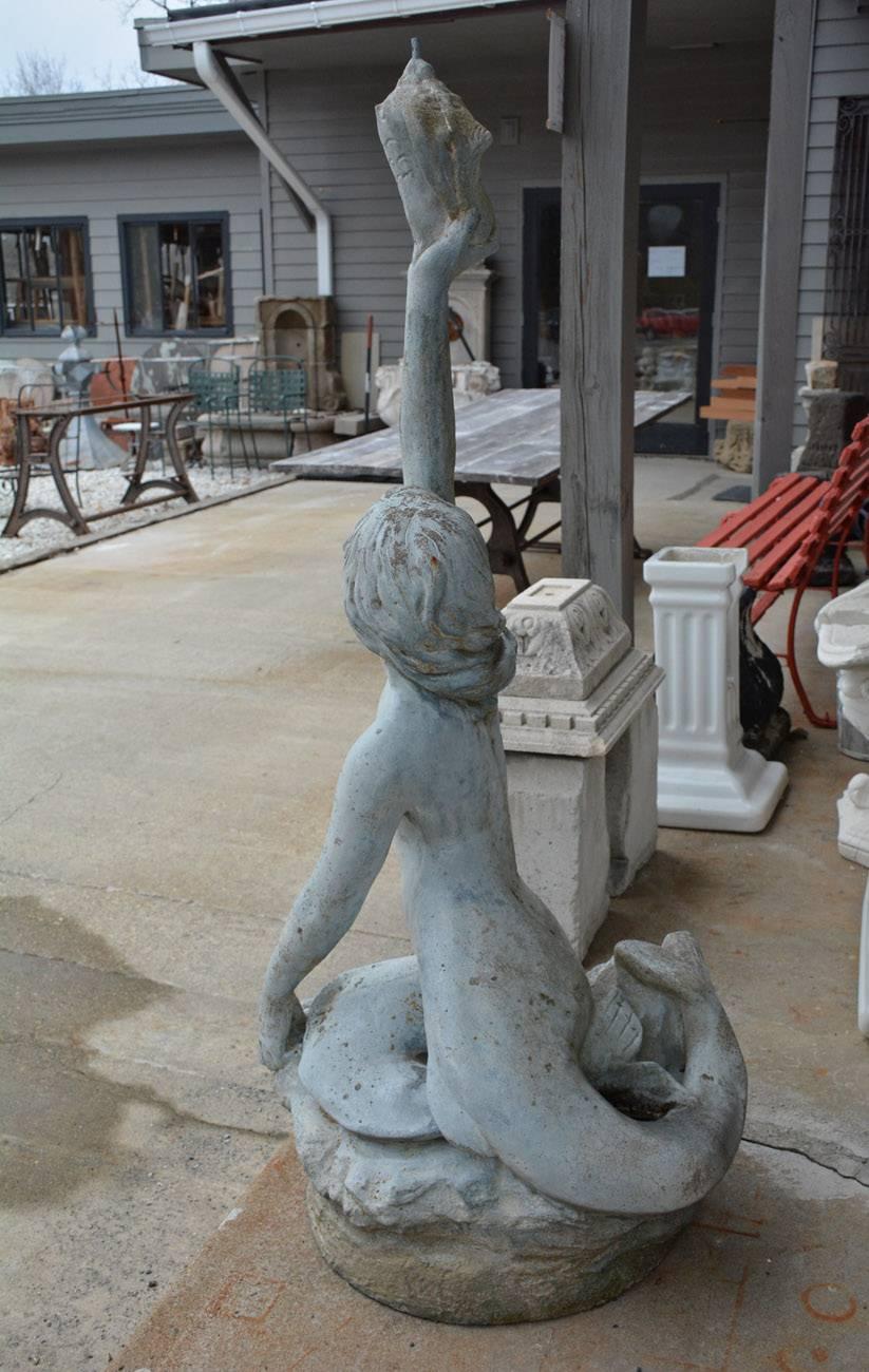 concrete mermaid fountain