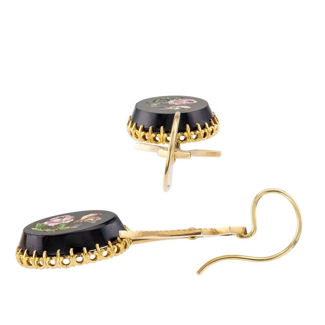 Victorian micro mosaic onyx and gold pendent earrings circa 1890. The articulated designs feature black onyx inlaid with a micro mosaic depicting a songbird perched on a rose, 14-karat yellow gold. Very pristine condition consistent with age and