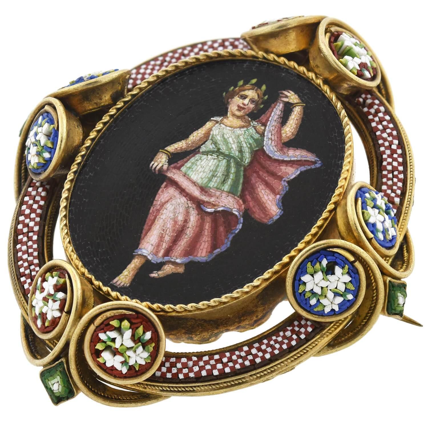 An absolutely wonderful micro mosaic pin/locket pendant from the Victorian (ca1880) era! The beautiful piece is crafted in vibrant 18kt yellow gold and an exceptional micro mosaic picture details the front. Tiny glass tiles of vividly colored glass