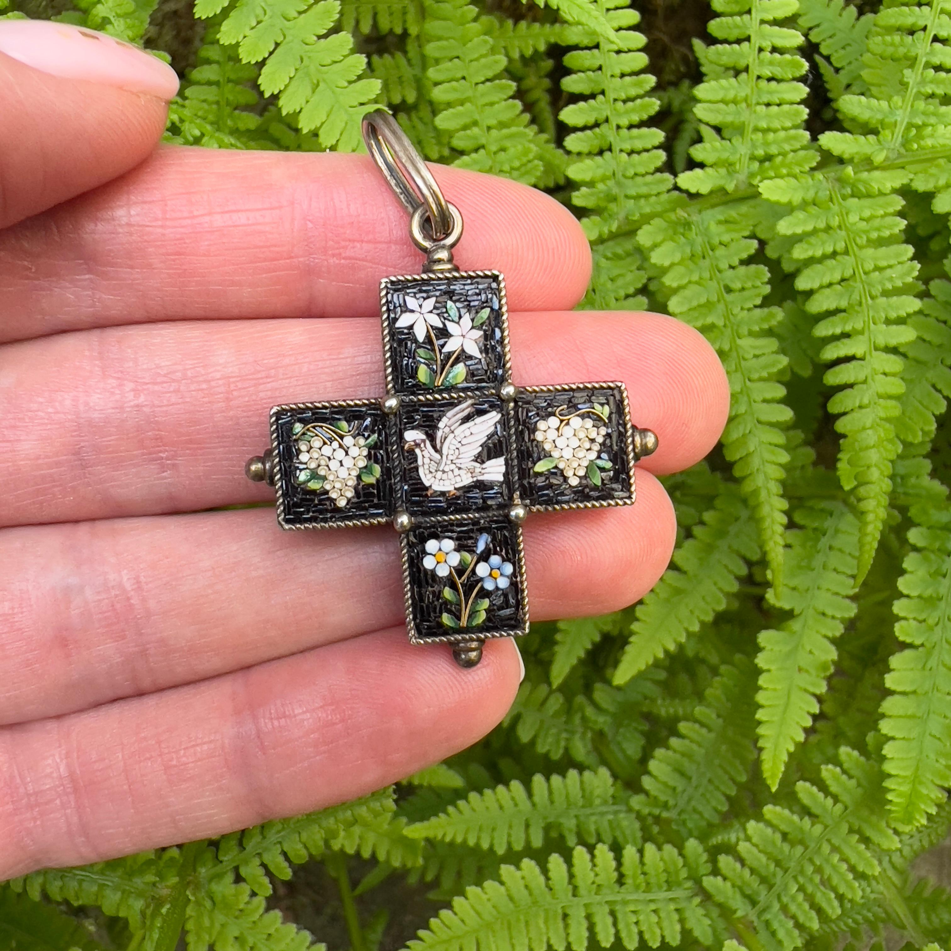 This beautiful pendant was created in Italy in the mid 1800s.

Condition Report:
Excellent

The Details...
Although un-hallmarked, this pendant tests as being constructed from silver. It features high quality and finely detailed micro-mosaic