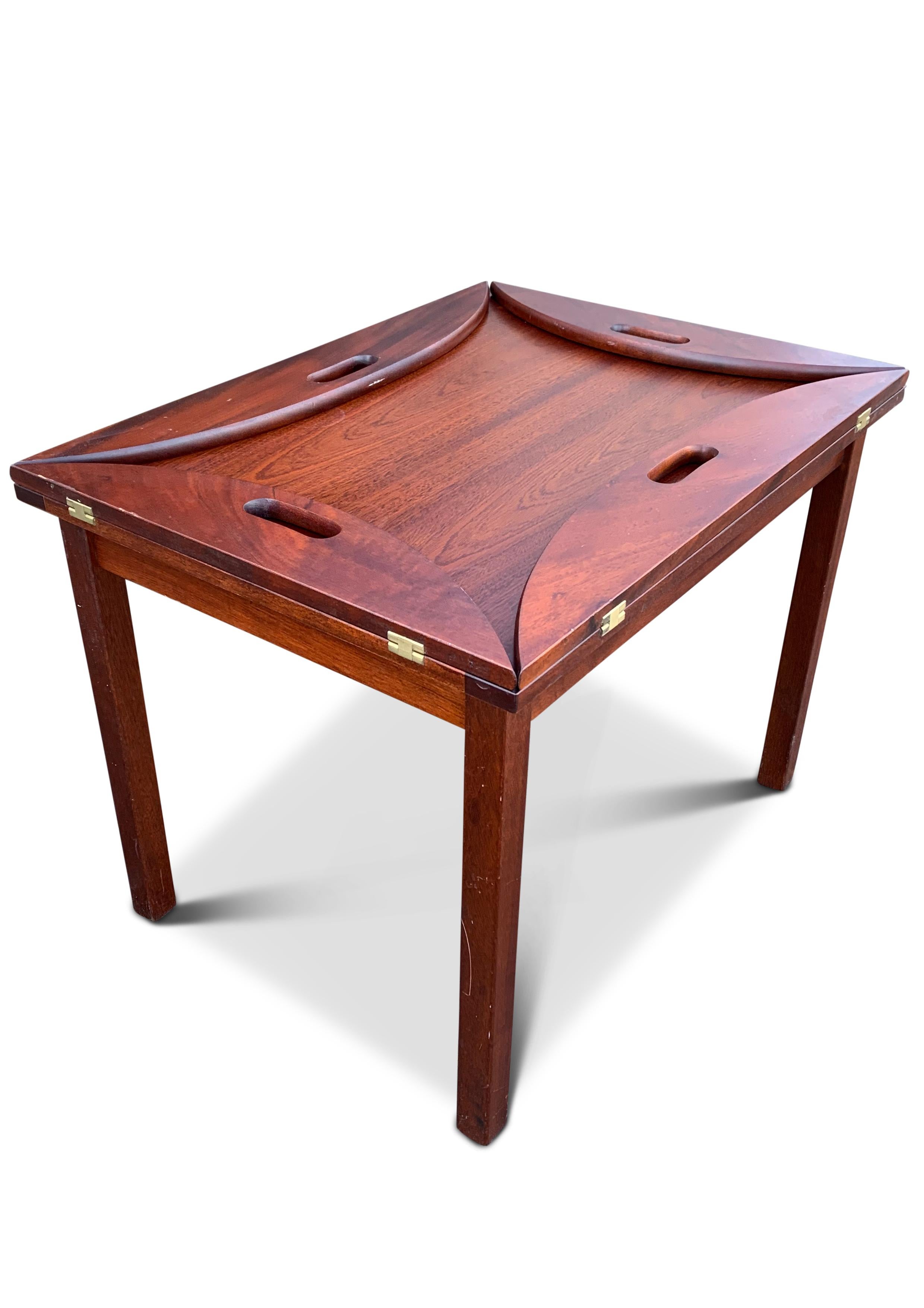 Victorian Military Campaign Style Mahogany & Brass Butlers Tray on Coffee Table Stand

Extra dimensions 

With the butlers tray leaves up 
Height 62cm
Width 72cm 
Depth 54cm 