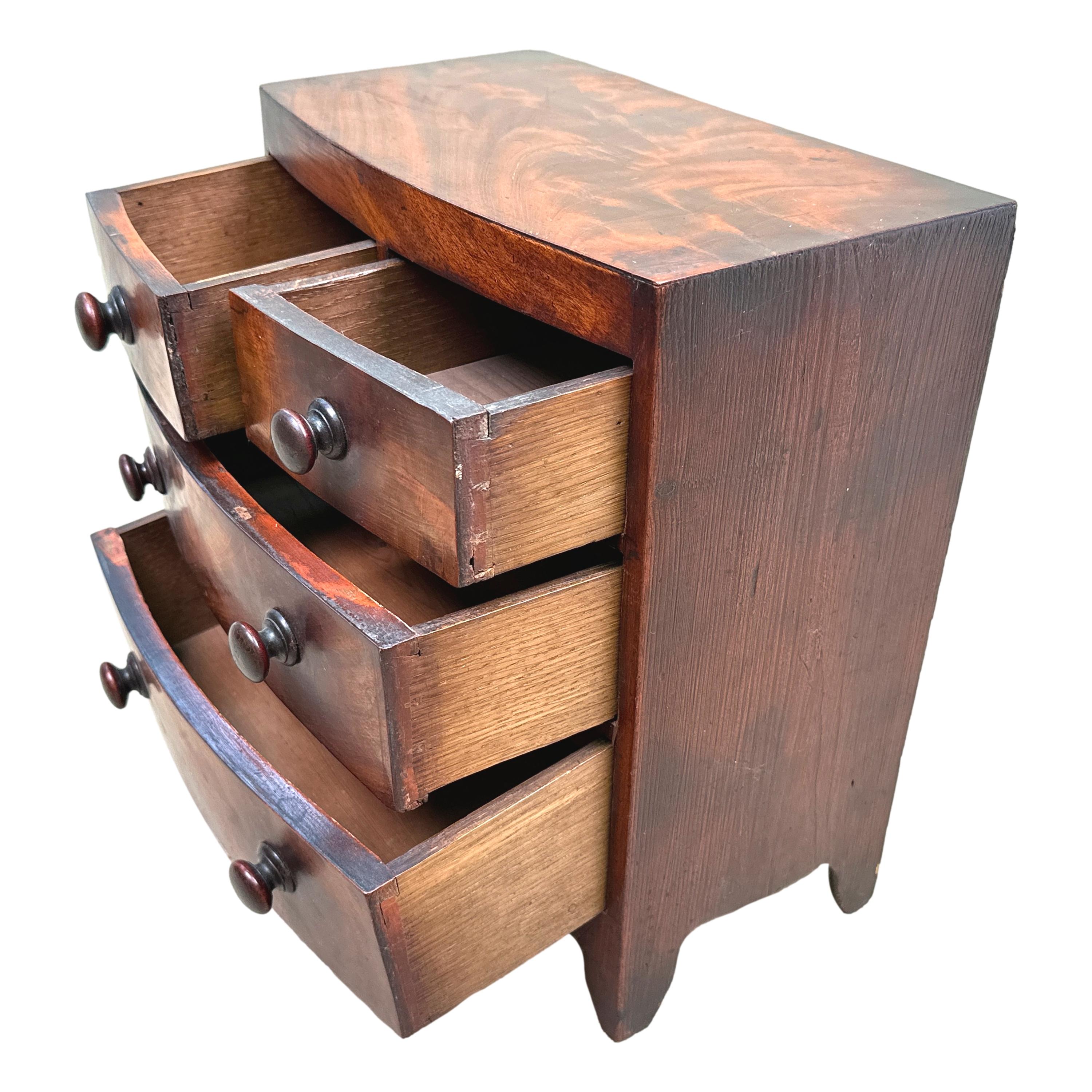 English Victorian Miniature Mahogany Bowfront Chest Of Drawers For Sale