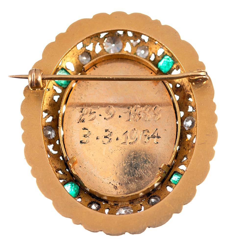 A truly beautiful antique treasure, which tells a story the details of which we may never know. The miniature portrait displays the profile of a lady and is framed by an elaborate hand-made golden filigree frame of 18 karat and speckled with