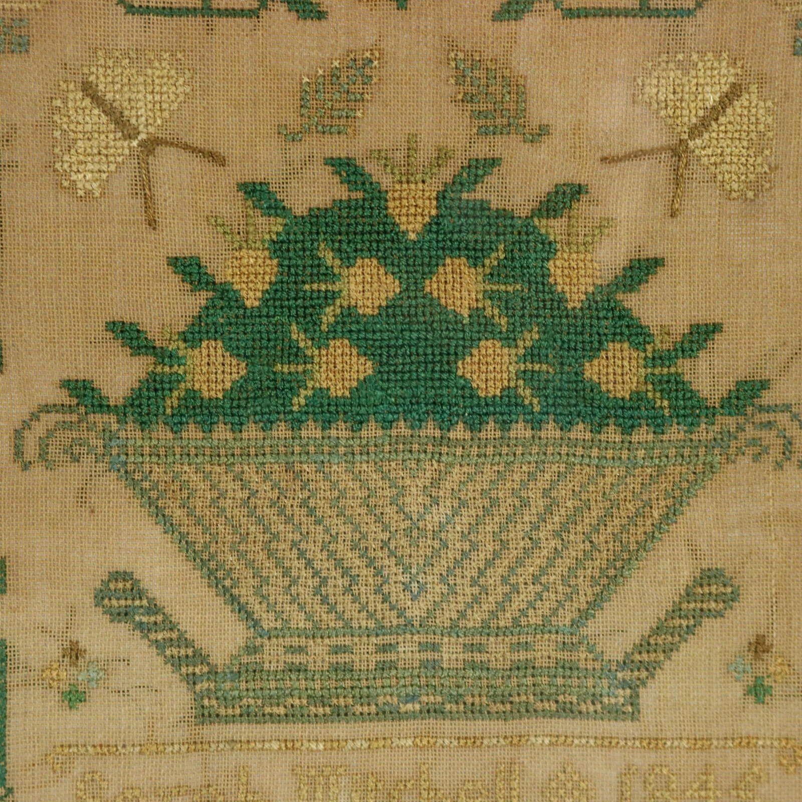 Victorian miniature sampler, 1846, by Sarah Mitchell. The sampler is worked in silk on a linen ground, in cross stitch throughout. Meandering strawberry border. Colours green, blue, gold and silver. Signed and dated 'Sarah Mitchell 1845'. A good set