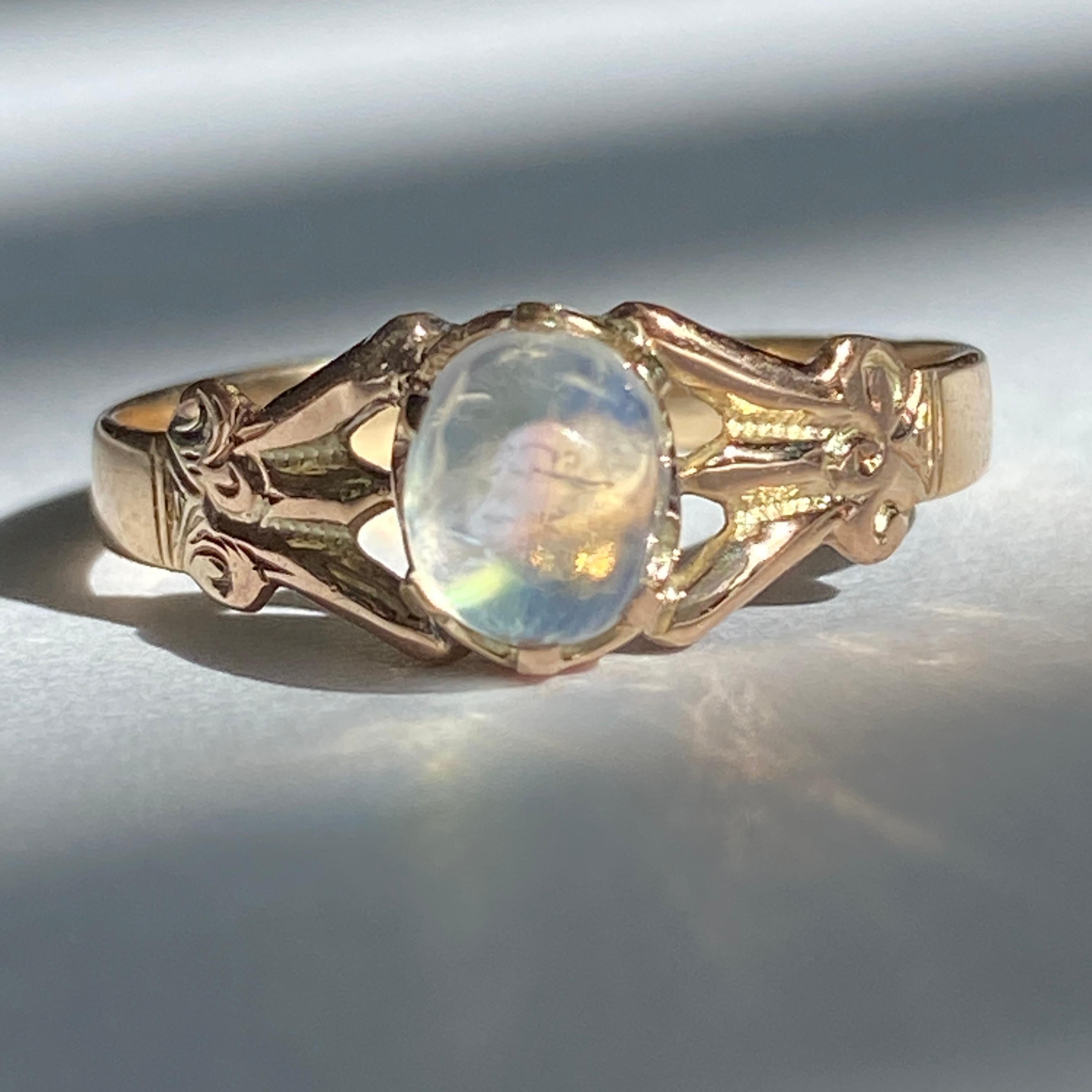 Details:
Super sweet Victorian ring with a bright moonstone orb. The ring is 14K rose gold, and has a lovely engraved pattern sounding the setting. There is one 5mm x 6mm cabochon moonstone with a pretty bright blue flare. Please ask all necessary
