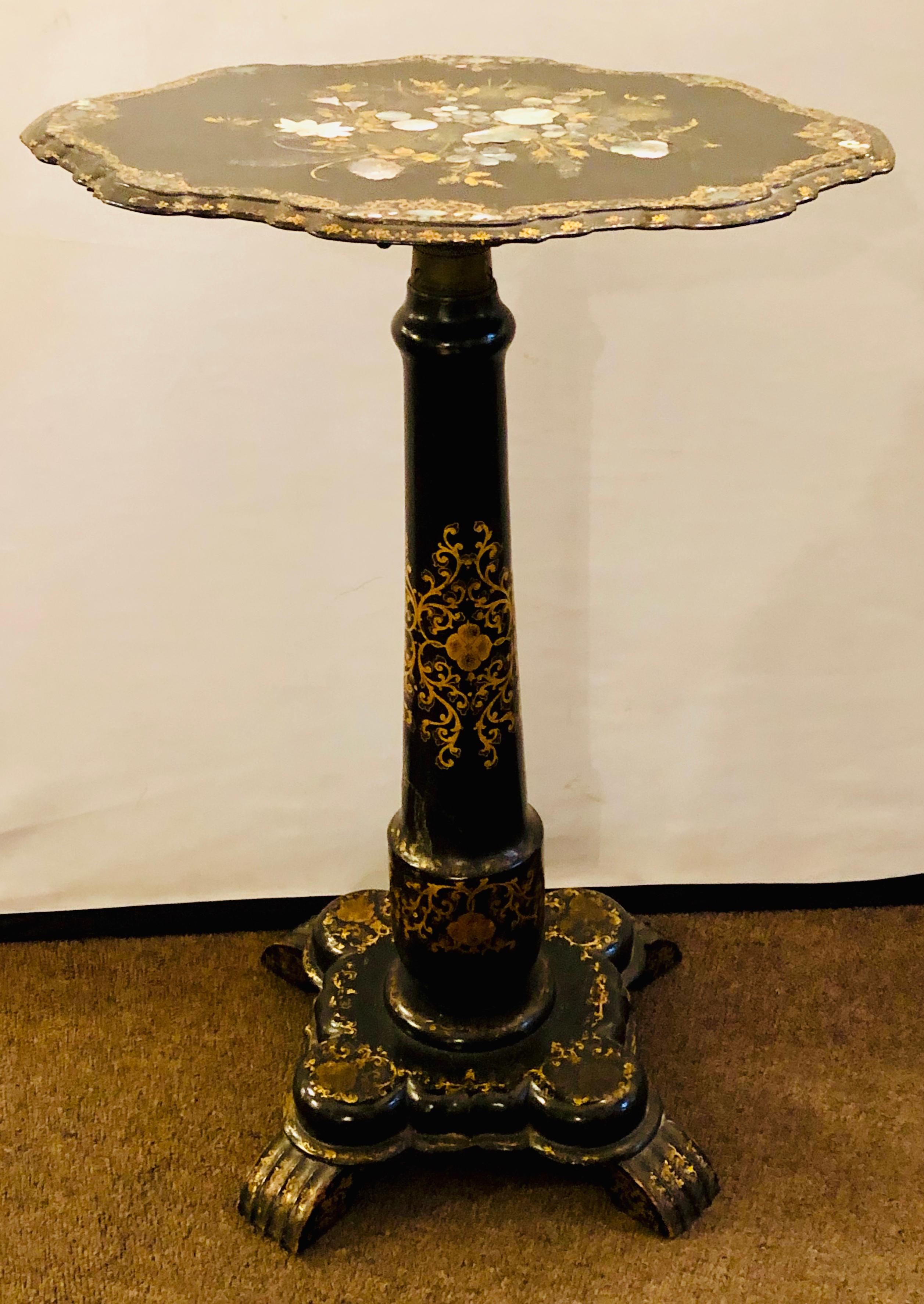 Victorian mother of pearl inlaid 19th century tilt-top candle stand / tea table


IZS Lia.