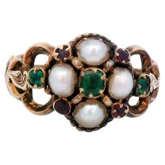 Anillo victoriano de luto con rubí esmeralda y perlas fechado en "1848" en oro de 18 quilates