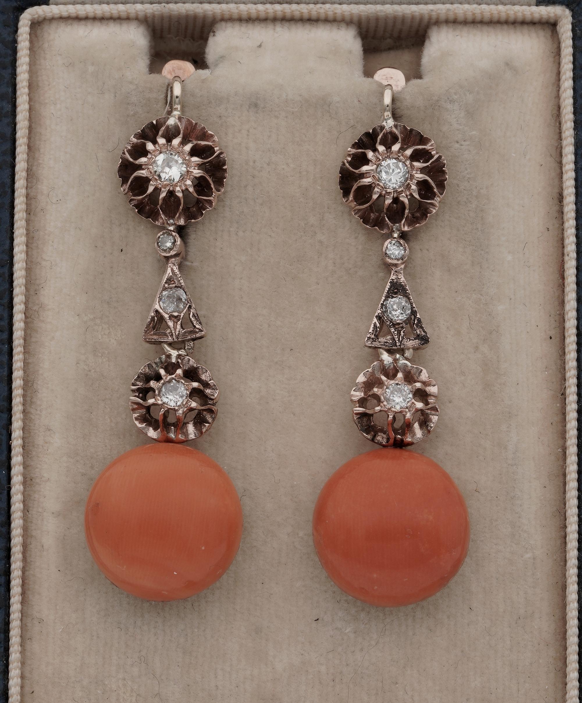 Past Treasures
A beautiful pair of antique Coral & Diamond earrings, 1890/1900 ca
marvellous in design, hand crafted of solid 12 KT gold 
Set with a fantastic selection of Natural untreated Salmon Red Coral blemish free; 14 mm. in diameter
Diamonds