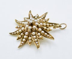 Victorian Natural Fine Seed Pearl Pendant in Yellow Gold in a Sun Star Fashion