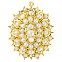 Broche-pendentif victorienne en demi-perles naturelles et diamants