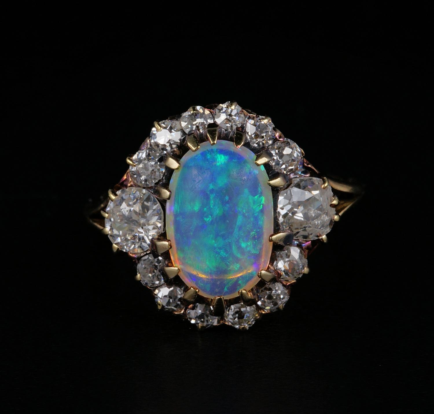 Scarce, hard to find, distinctive Opal ring from the Victorian period are sought after worldwide. This striking Victorian example is one of the more beautiful indeed.
English origin, 1880 ca, it has it all! Charming oval design with two large side