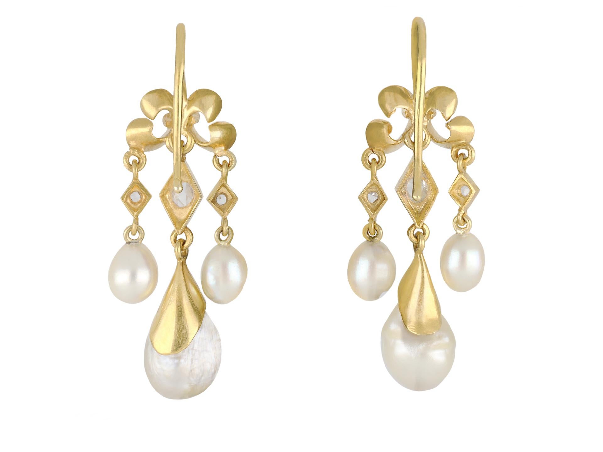 Victorian natural pearl and diamond drop earrings. A matching pair, each set with three drop shape natural saltwater pearls, in closed back half-drilled settings, six in total, ranging from 6.4 - 6.8mm, to 9-10mm in size, further set with five