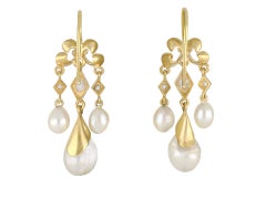Victorian natural pearl and diamond drop earrings, circa 1870.