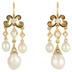 Victorian natural pearl and diamond drop earrings, circa 1870.