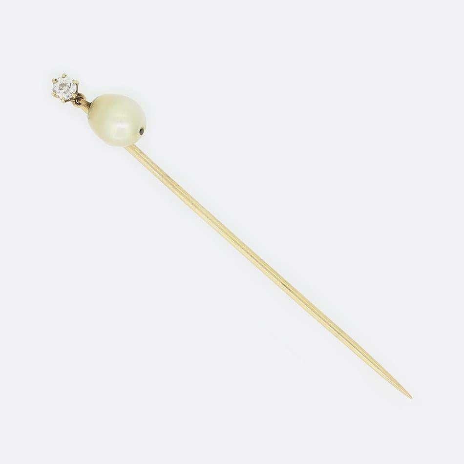 This is a pearl and old cut diamond stick pin. The pin consists of one claw set diamond with a natural pearl able to move freely below.

Condition: Used (Very Good)
Weight: 1.6 grams
Diamond Carat Weight: Approx. 0.10 Carats
Dimensions: 61mm x 6mm x