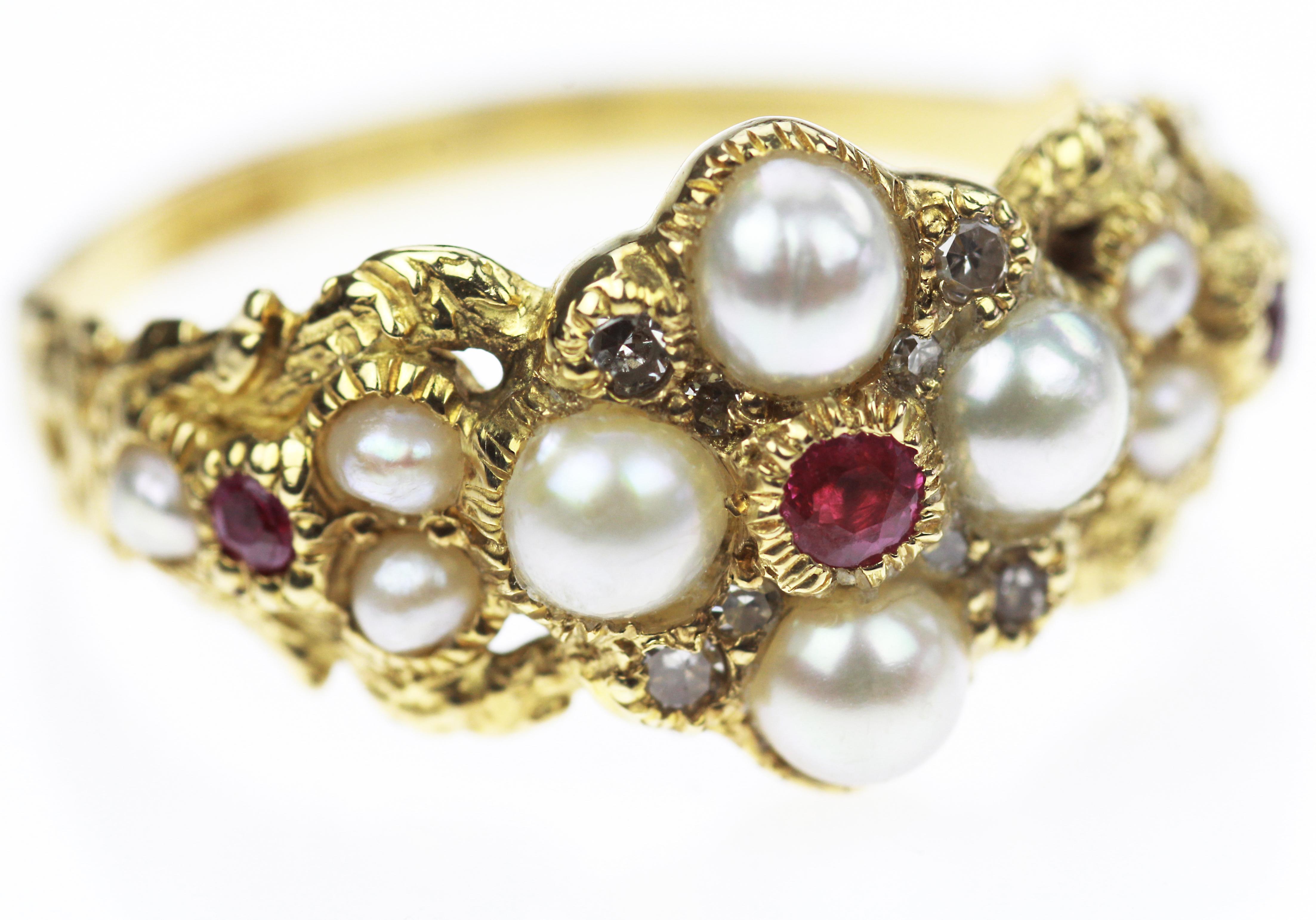 Beautiful pearl, ruby and diamond ring, created with passion to be cherished with love. It is based on a peculiar yellow gold band ring inscribed with intricate patterns. The yellow gold effortlessly glows, is silky smooth and is able to reflect