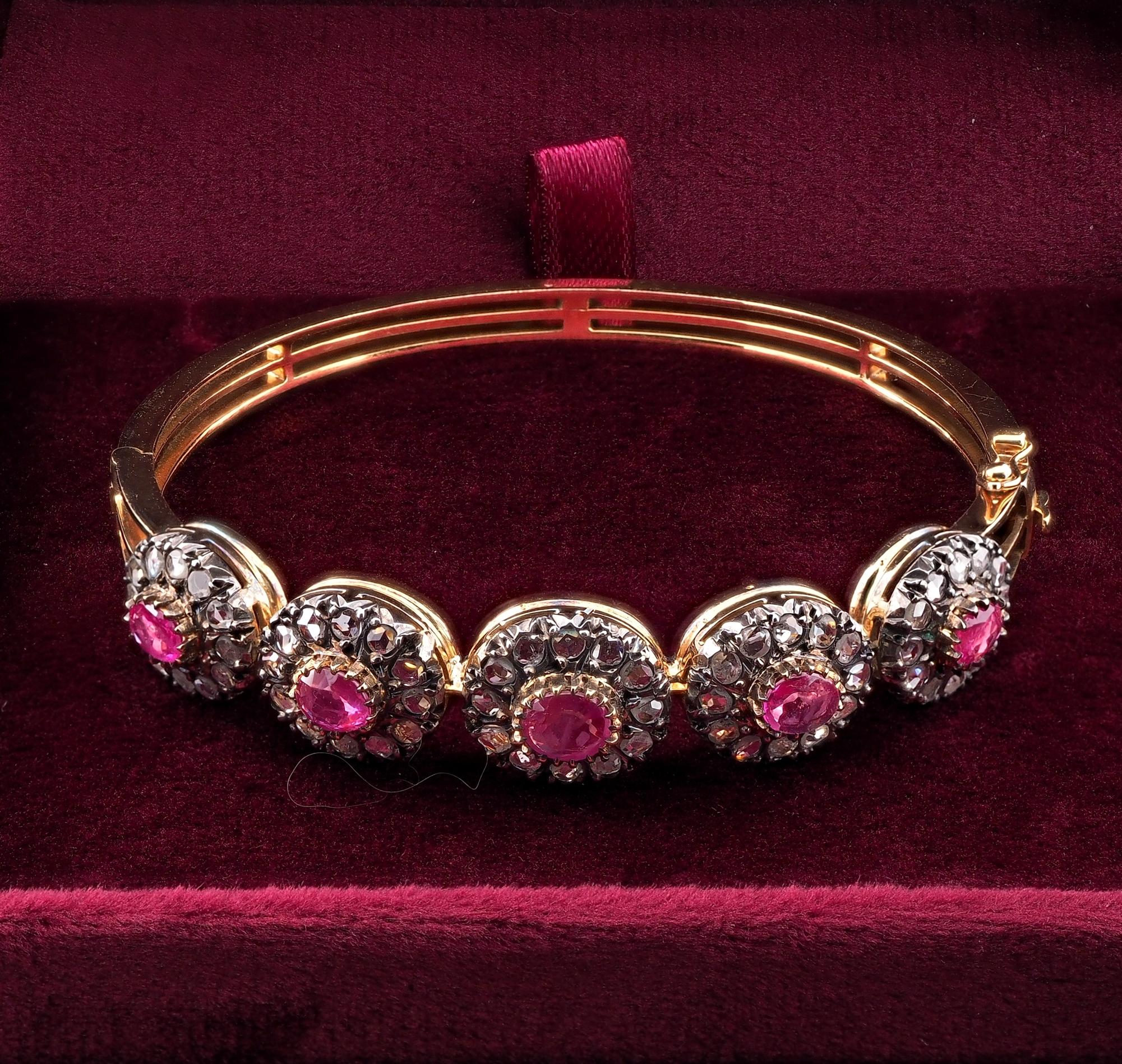 A gorgeous Diamond and Ruby rare bangle that is in the Victorian tradition, 1890 ca
Hand crafted of solid 18 Kt gold with portions of silver for the Diamond housing
Stunning riviere design of multiple Diamond and Ruby clusters composing an array of