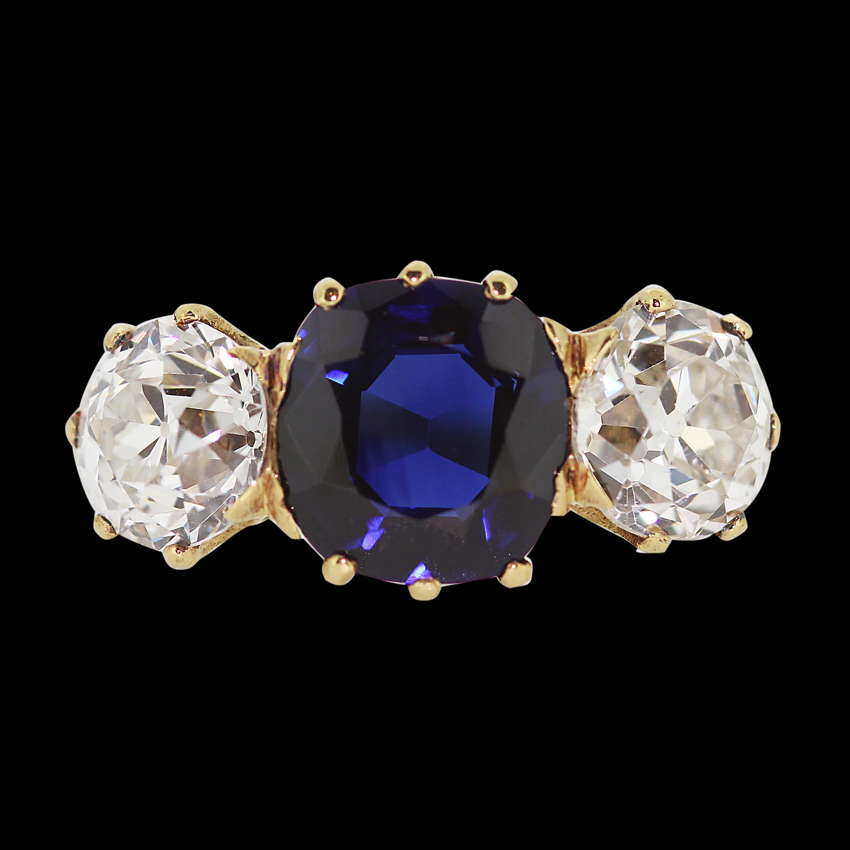 Victorian beautiful sapphire and diamond 3 stone ring in original antique mount. Cushion cut sapphire is natural untreated with certificate, medium blue colour with weight 2.77 carats. 
2 old cut diamonds on both sides and total estimated diamond