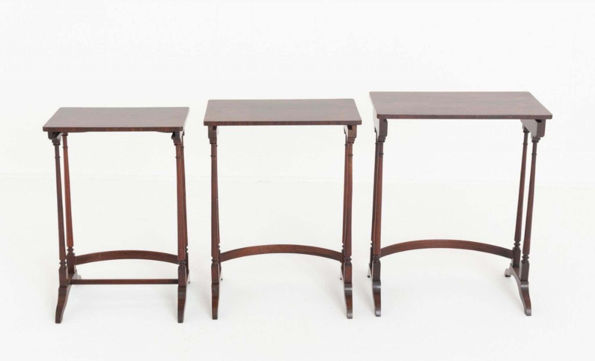Nest of 3 Victorian Tables.
Circa 1860
These Tables Stand Upon Sleigh Feet With Turned Uprights.
The Tops of The Tables Featuring Pretty Rio Rosewood Veneers.
A nest of tables is a set of small tables designed to be stored together in a stacked