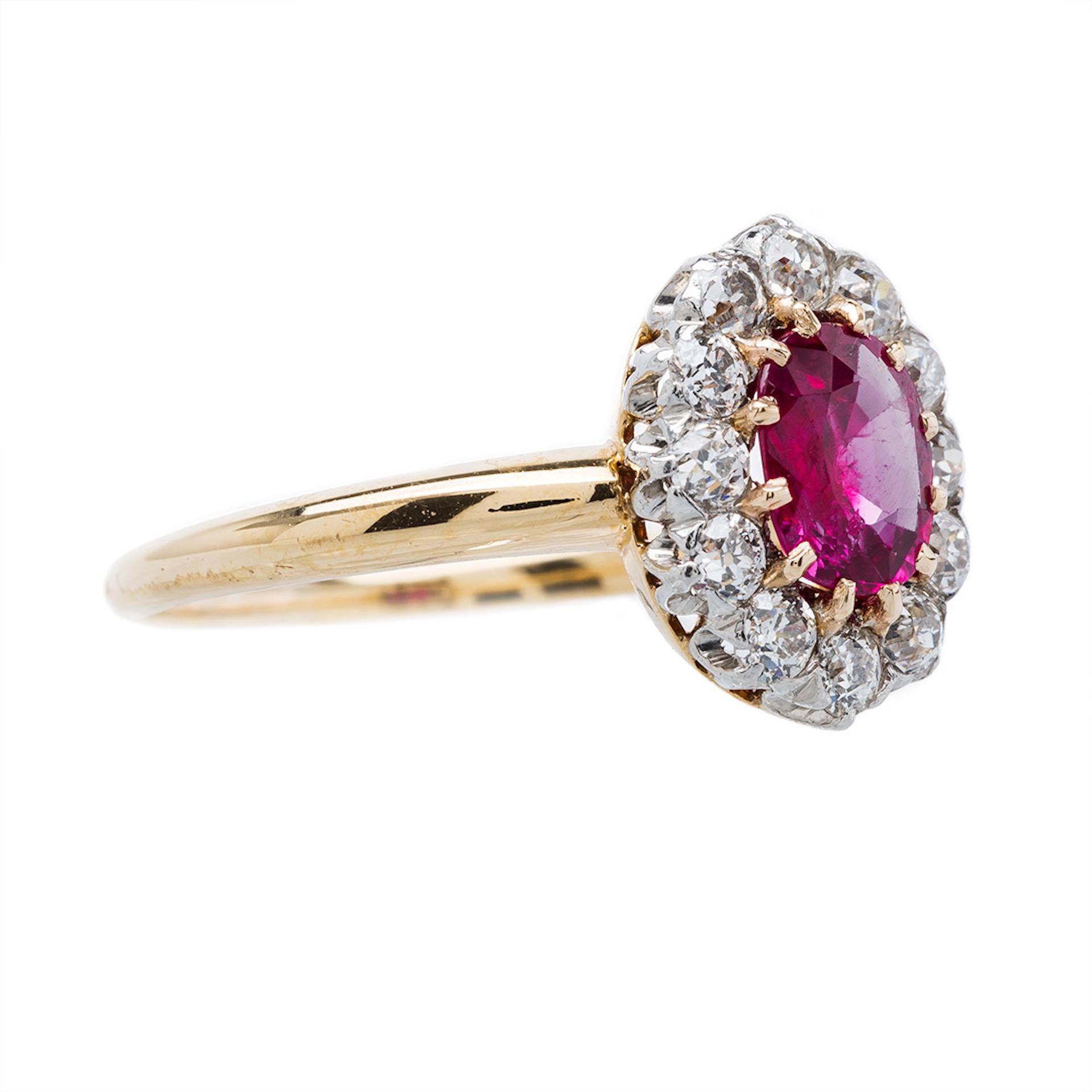 This ring is a beautiful and authentic Victorian era (circa 1895) platinum topped 18k yellow gold ring. This classic antique ring features an brightly saturated 0.81ct Oval Cut ruby accompanied by a AGL certificate stating the ruby is Unheated with