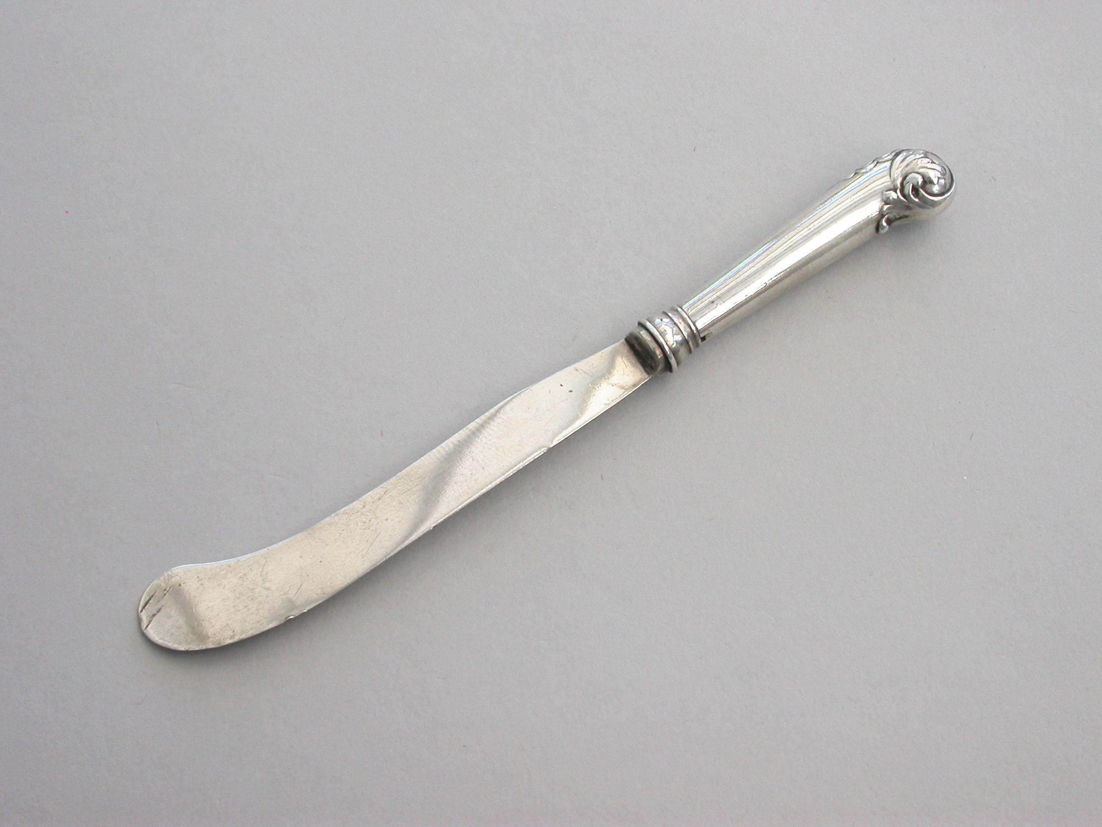 A rare Victorian novelty silver Propelling Pencil made in the form of a Butter Knife, the pistol shape handle with leaf capped terminal.

By Sampson Mordan & Co, circa 1882. Also stamped with a diamond registration mark for 3rd August