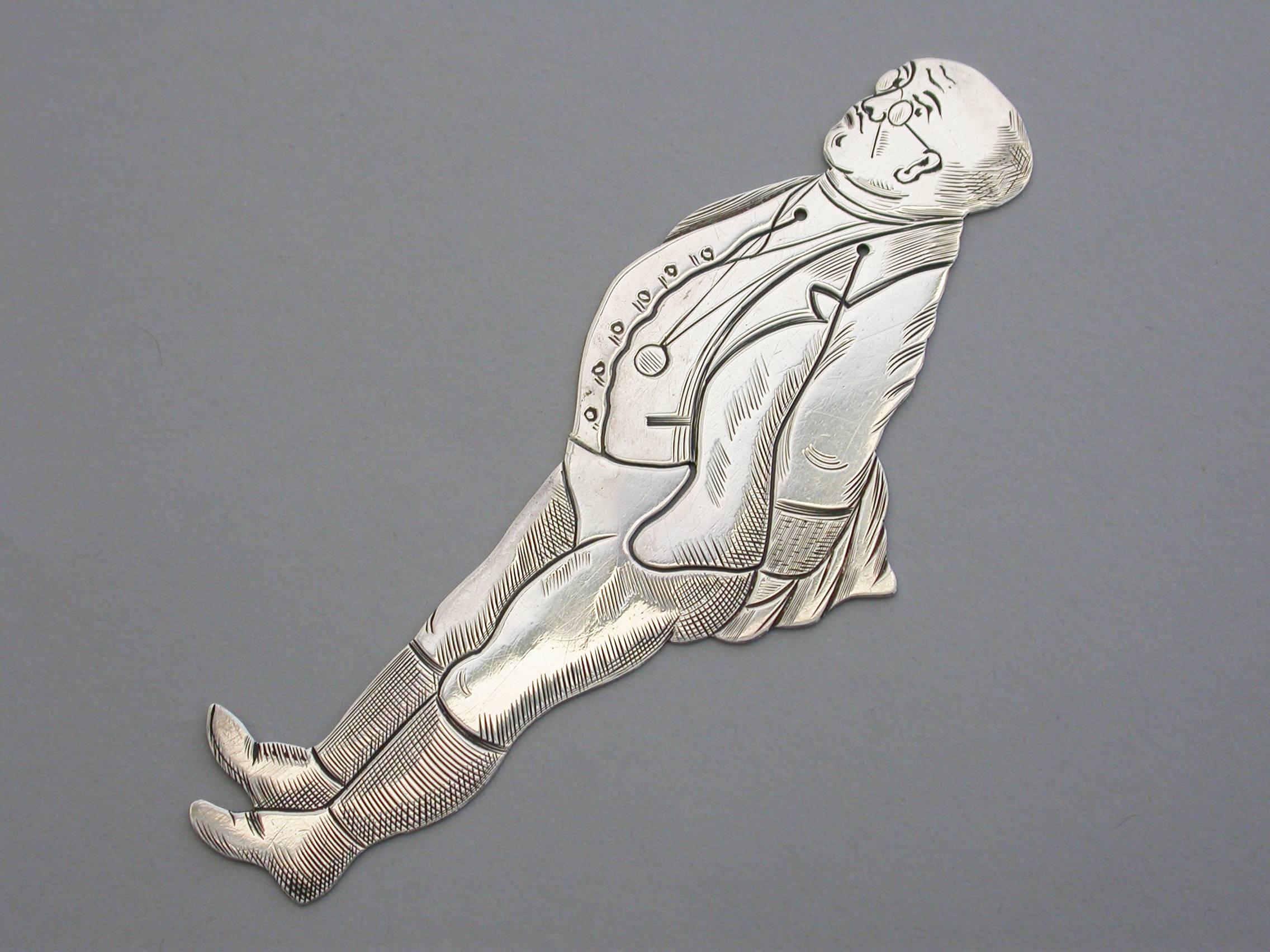 A rare Victorian novelty silver figural bookmark depicting the character of Samuel Pickwick from Charles Dickens's novel 'Pickwick Papers', of flat cut-out form with engraved decoration depicting Mr Pickwick (General Chairman - Member Pickwick Club,