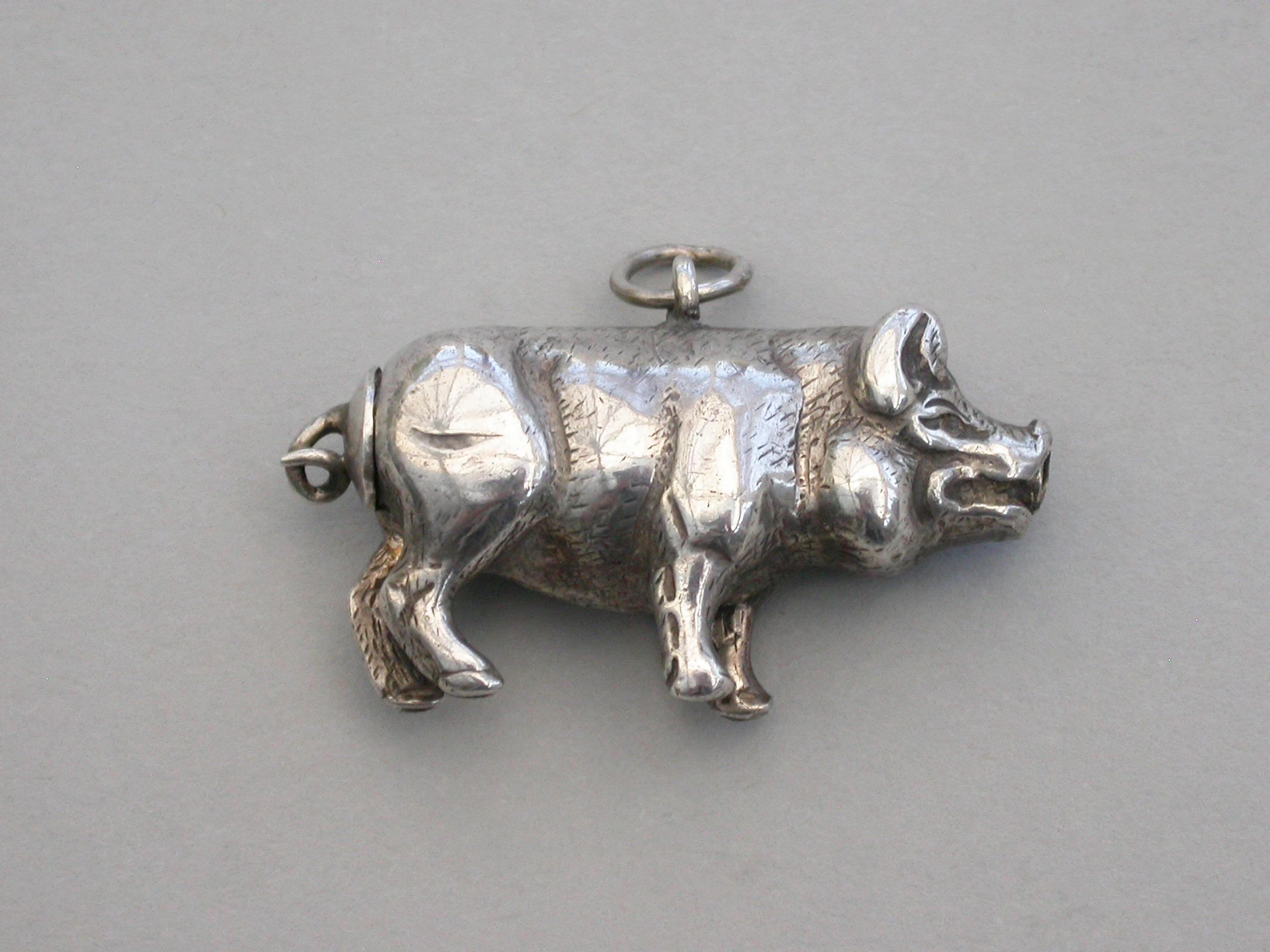 A rare Victorian novelty silver propelling pencil, made in the form of a pig, with attached suspension ring.

By Sampson Mordan, circa 1880

Measures: Open 60 mm
Closed 34 mm.

Weight 16.00 Grams (0.51 troy ounces).