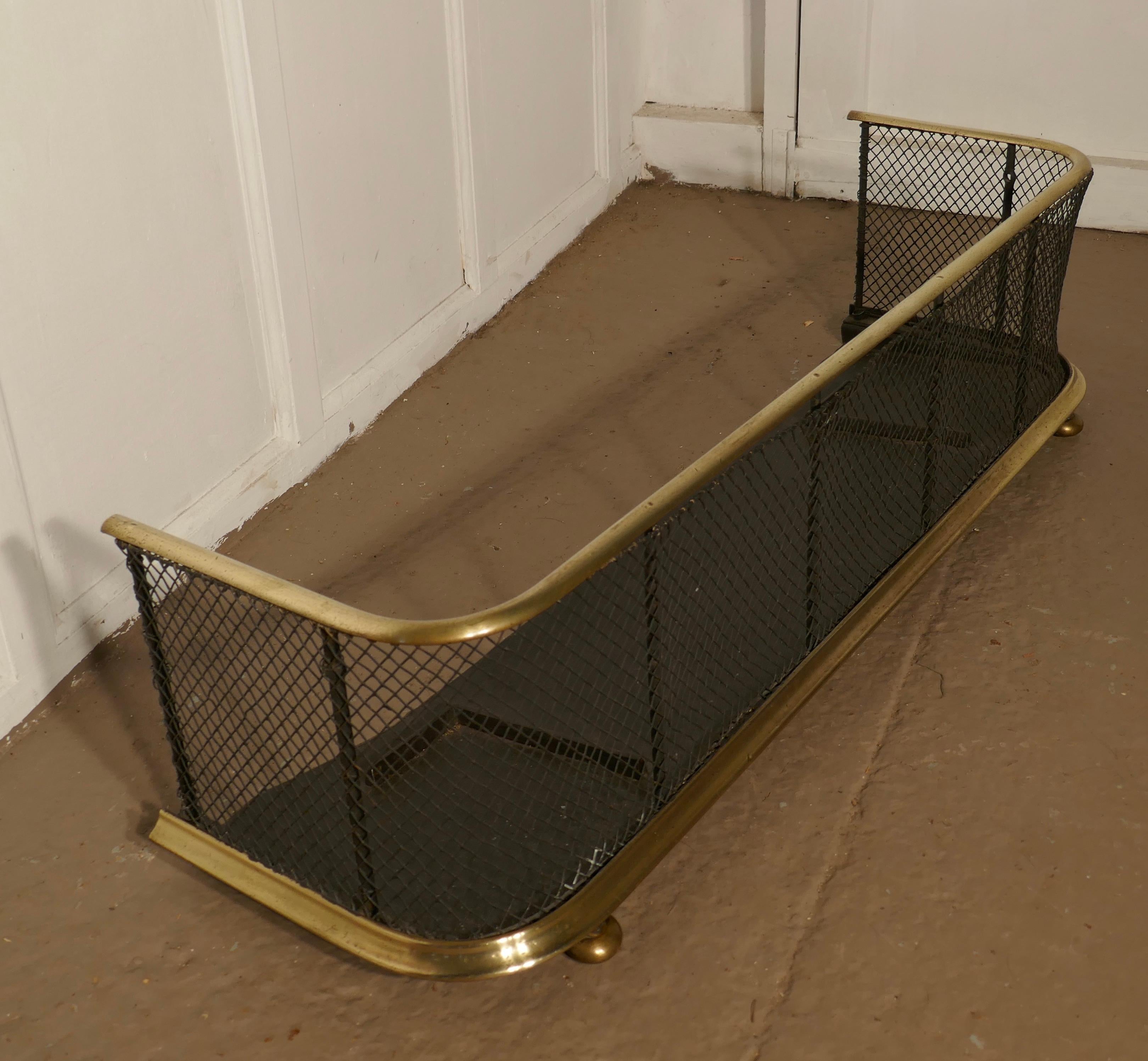 Victorian nursery fire guard or club fender

An early Victorian antique club fender often known as a nursery guard as it completely surrounds the fire 
The slightly curved brass topped rail is in very good order as is the base rail and wire mesh,