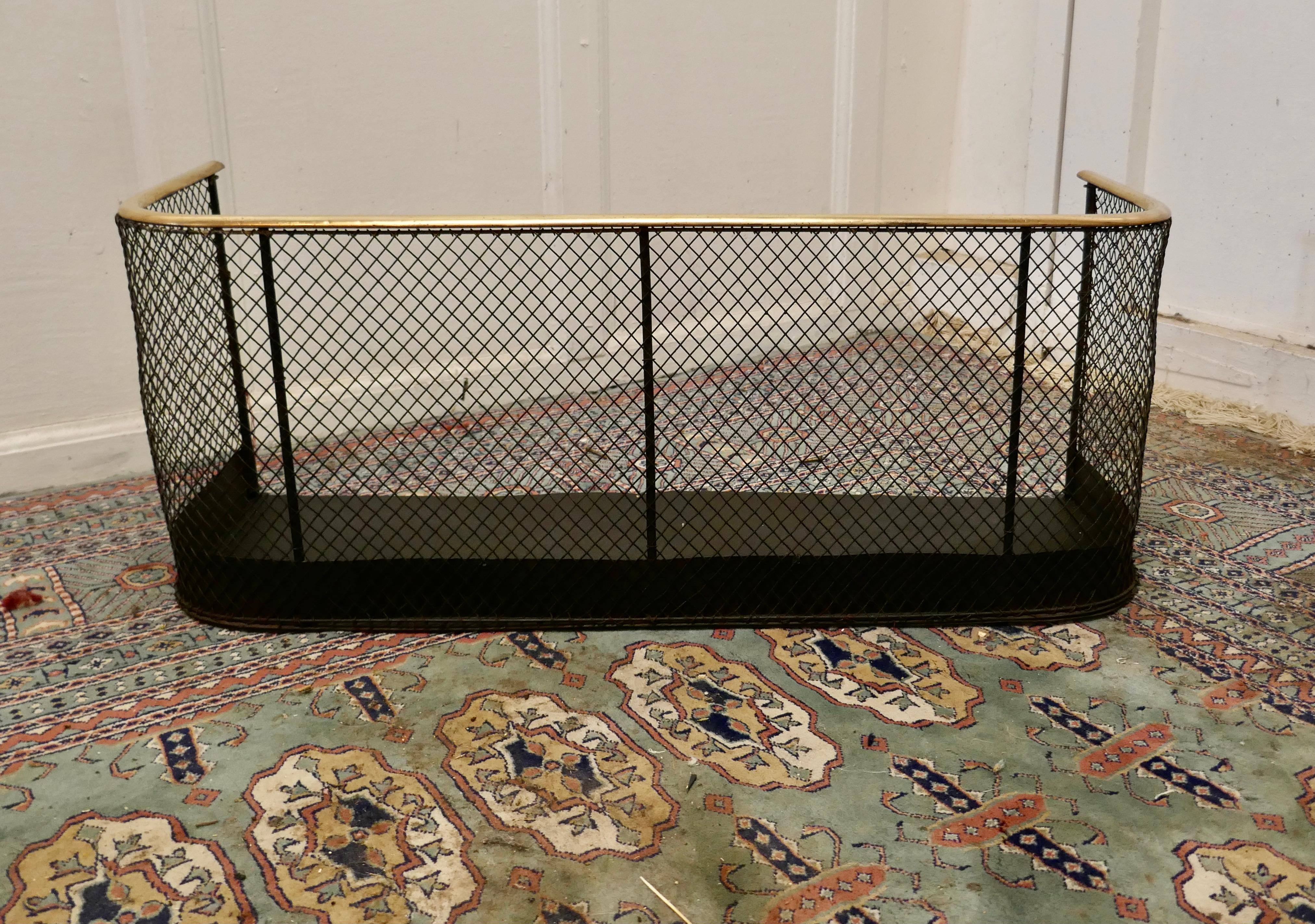 Victorian nursery fire guard or club fender

A Victorian antique club fender often known as a nursery guard as it completely surrounds the fire 
The slightly curved brass topped rail is in very good order as is the wire mesh 
The fender is 12”