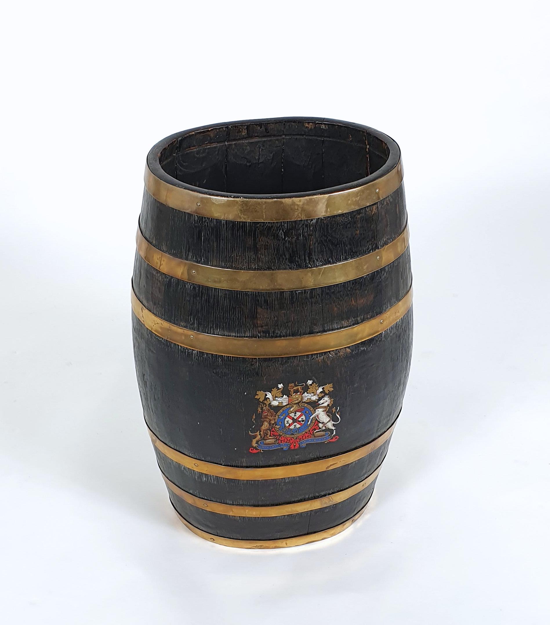 This very handsome and quirky Victorian oak and brass stick stand is painted with a Royal coat of arms and was originally a wine or ale barrel. It measures 23 in – 58.5 cm in height with a width of 15 in – 38.1 cm and a depth of 11 in – 28 cm. This