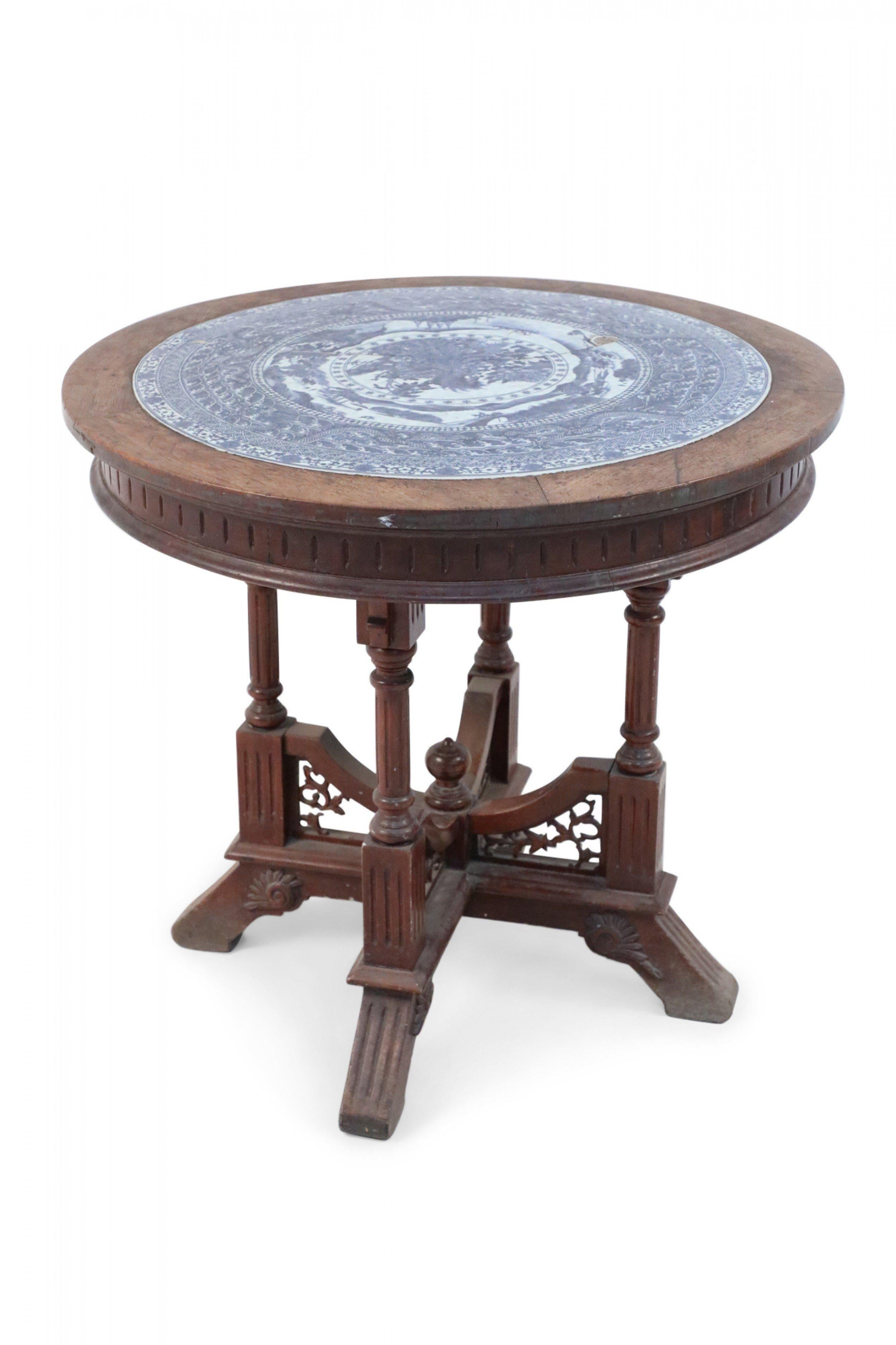 that's a small victorian round wooden table