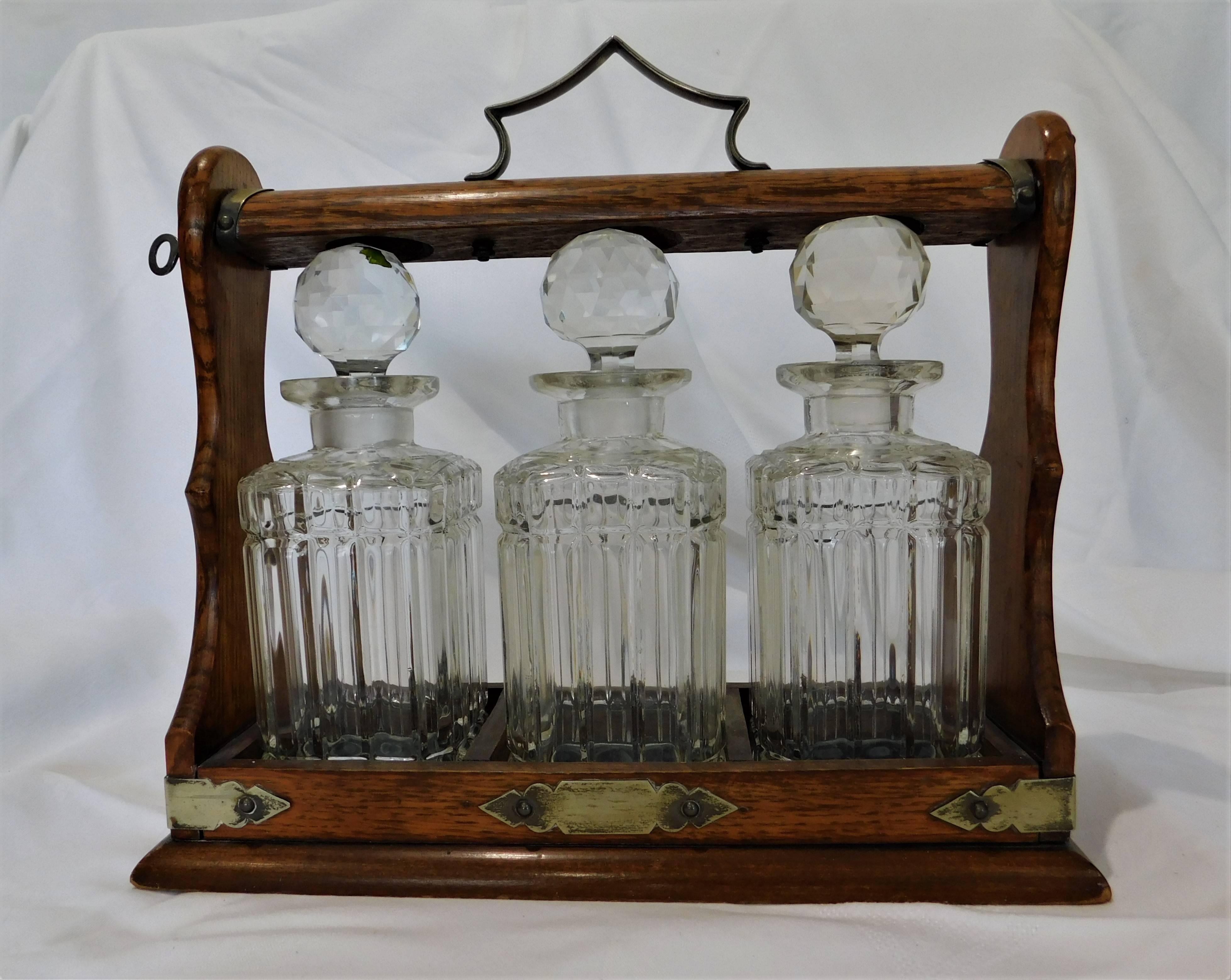 English Victorian Oak and Silver Metal Tantalus with Crystal Decanters For Sale