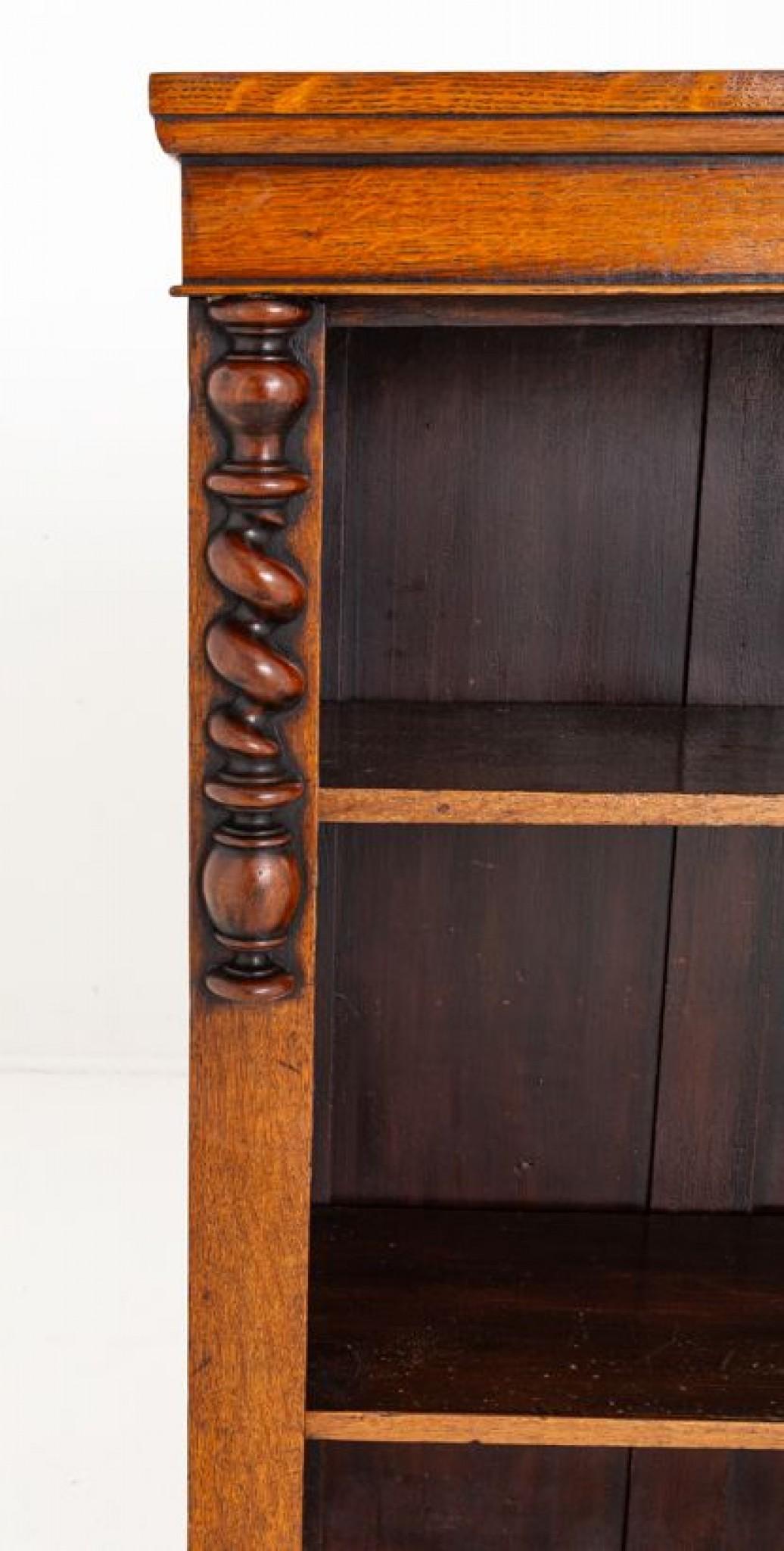 Victorian Oak Open Bookcase.
This Bookcase Stands Upon a Plinth Base.
Circa 1870
Featuring 2 Adjustable Shelves.
The Shelves are Flanked by Uprights Which Feature Barley Twist Turnings and Carved Corbels.
Presented in good condition.