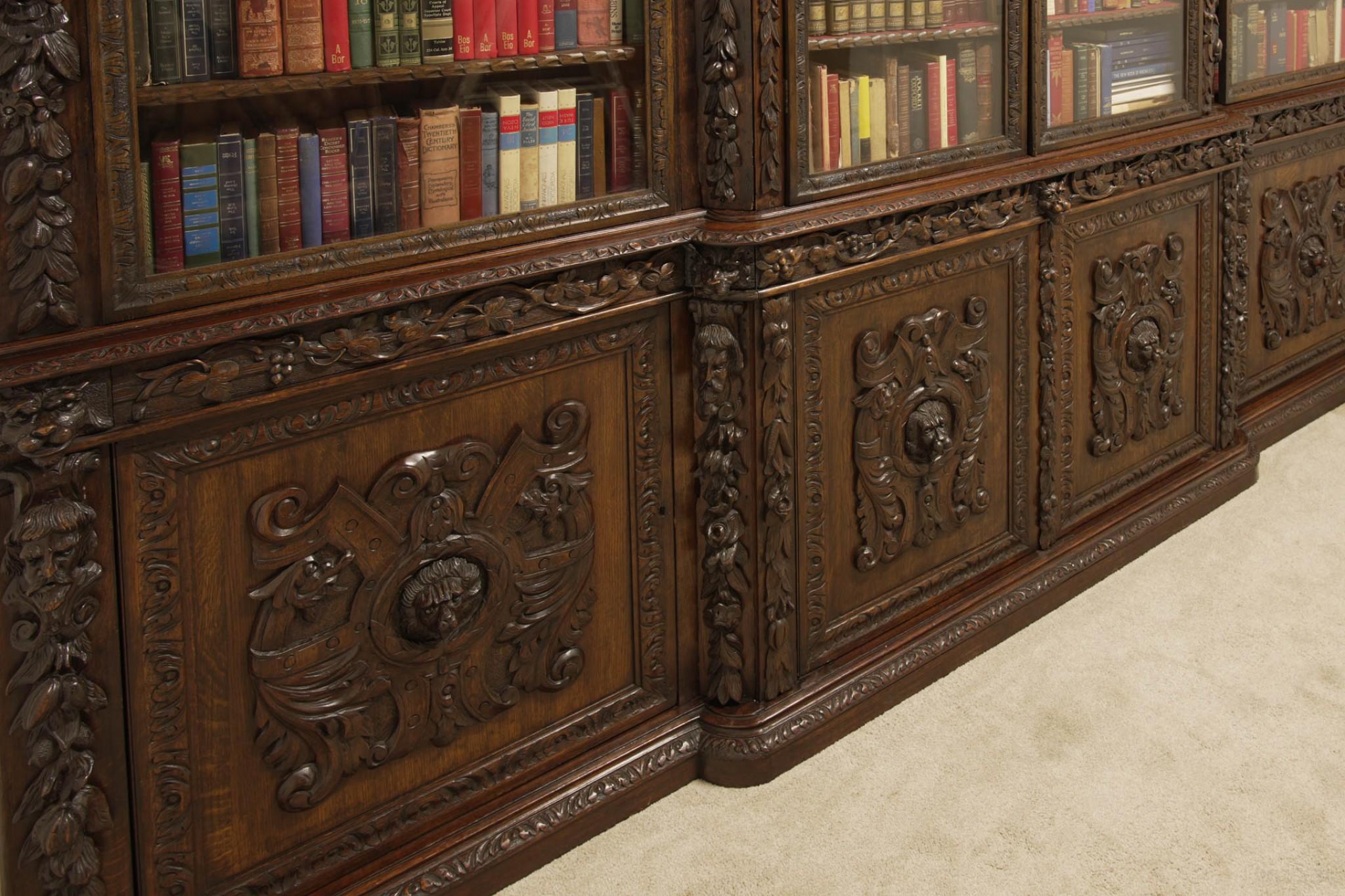 You are viewing a gorgeous monumental carved Victorian library bookcase of breakfront form
The bookcase is circa 1870 and was sourced from Miskin Manor - a Stately home in South Wales (please scroll through for photos of this originally in situ)
The