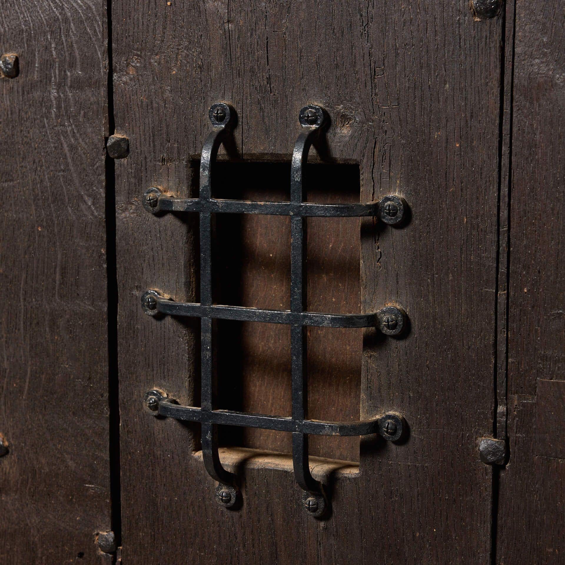 wood front door with peephole