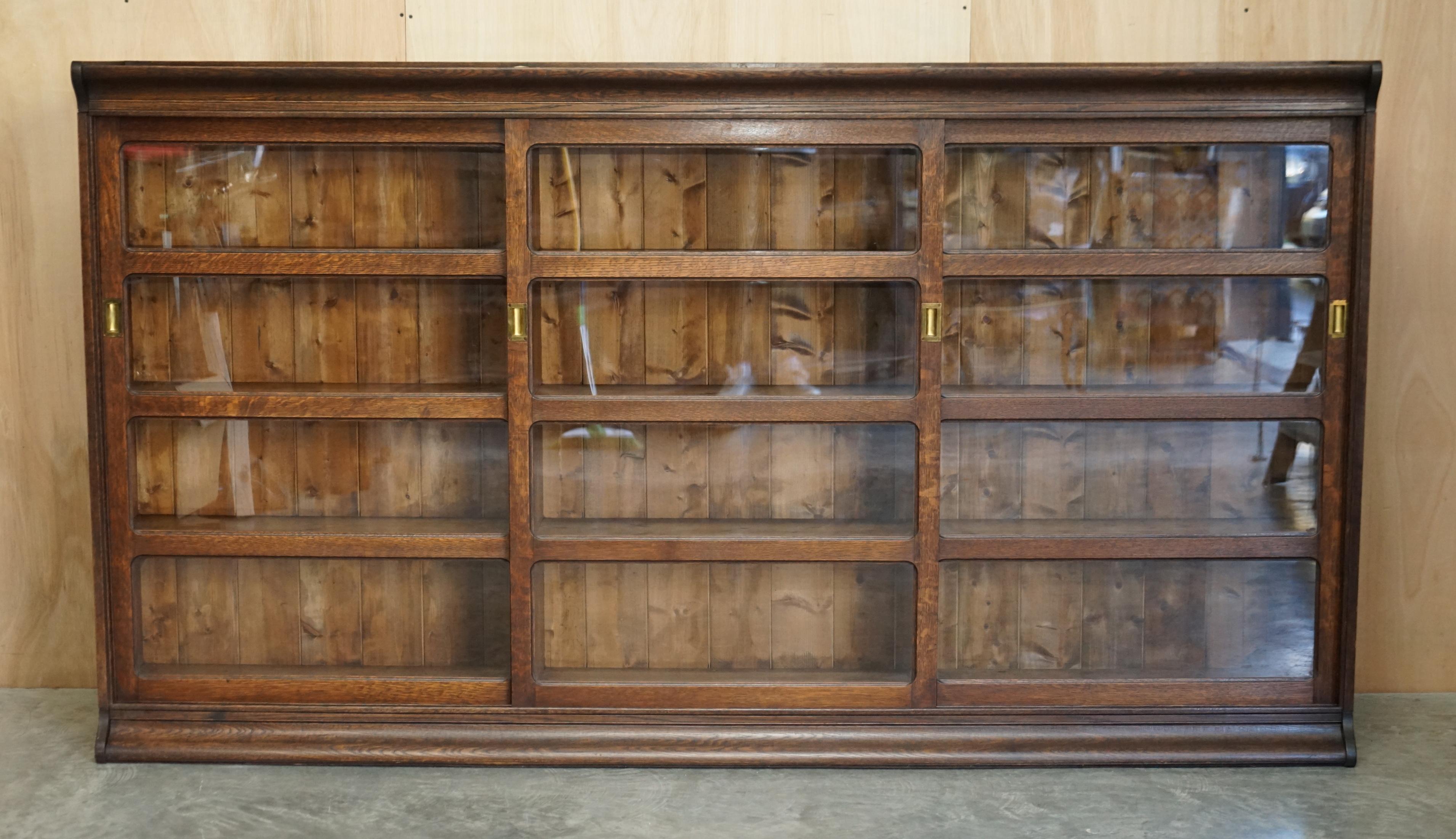 We are delighted to offer for sale this stunning original mid-Victorian Apothecary or Haberdashery cabinet library bookcase or sideboard

This is a very good looking and well made piece. It is a good height and wonderful width, ideally suited for